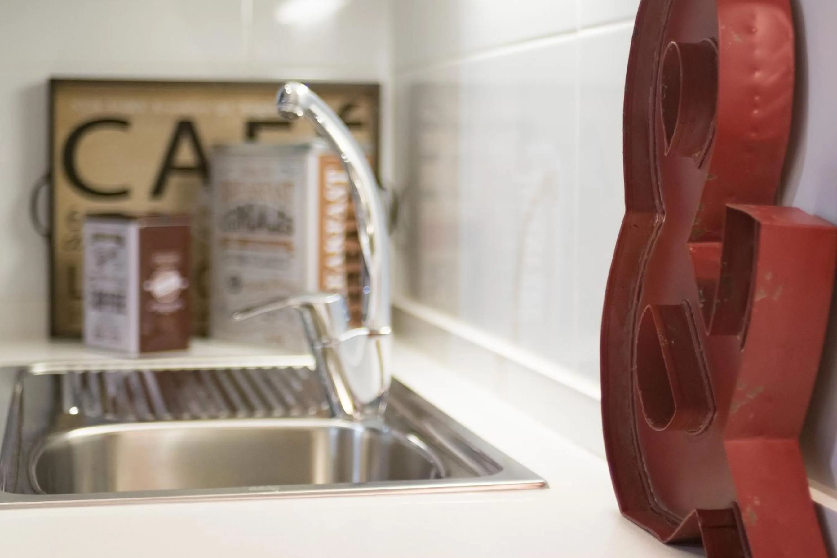Kitchen or kitchenette in Habitat Apartments Cool Jazz