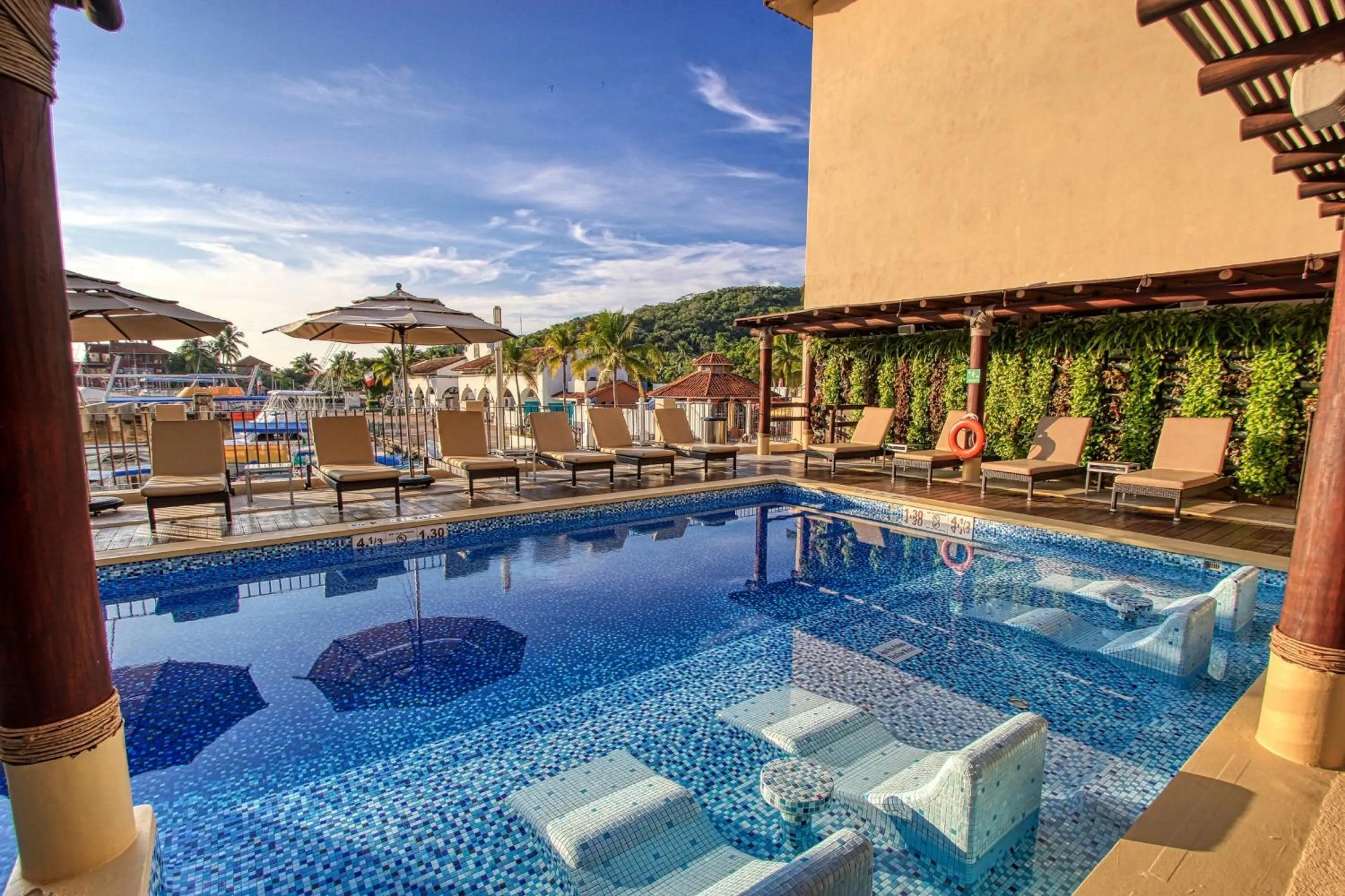 Swimming pool in Holiday Inn Huatulco by IHG