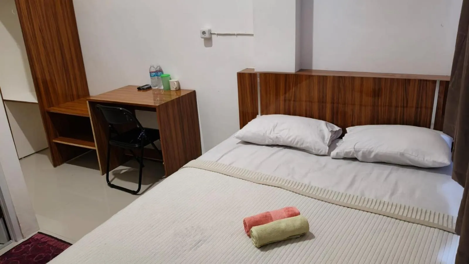 Bed in Sakura Guesthouse & Spa