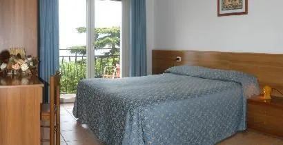 Bed in Hotel Residence Sirenella