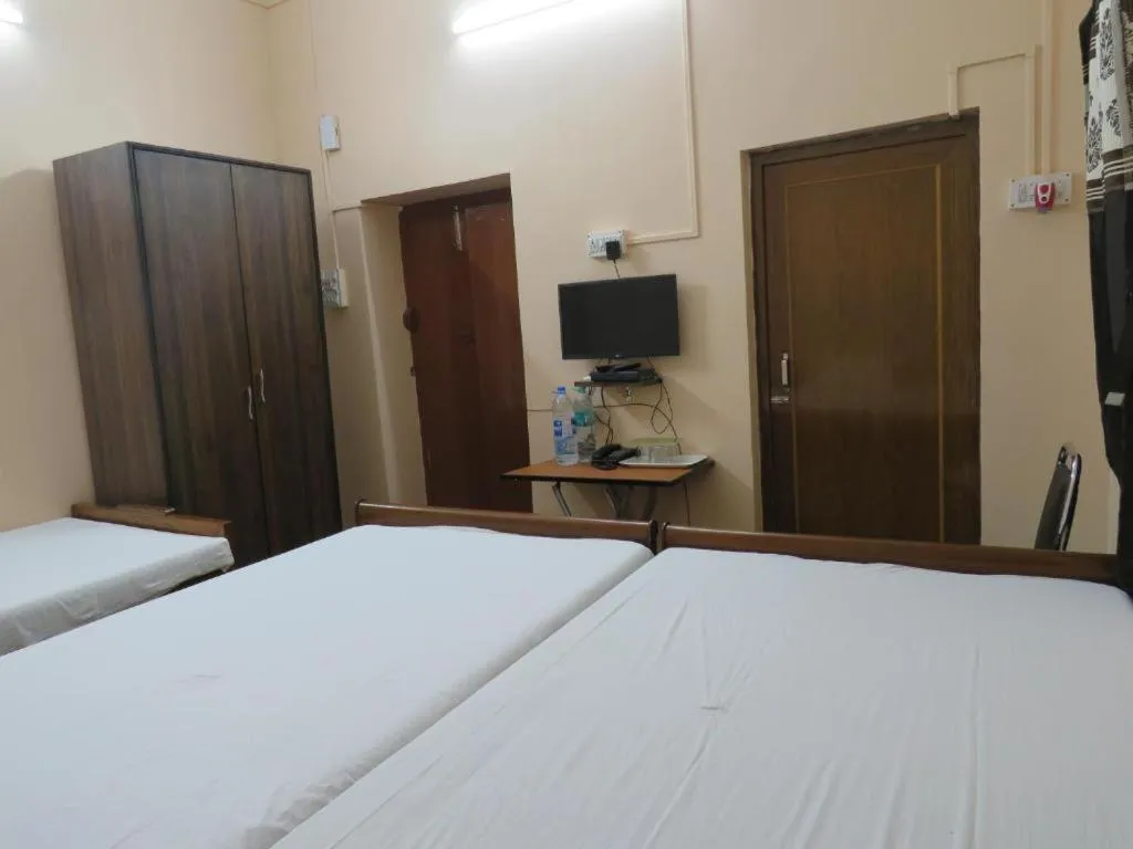 Bed in Shaw Guest House