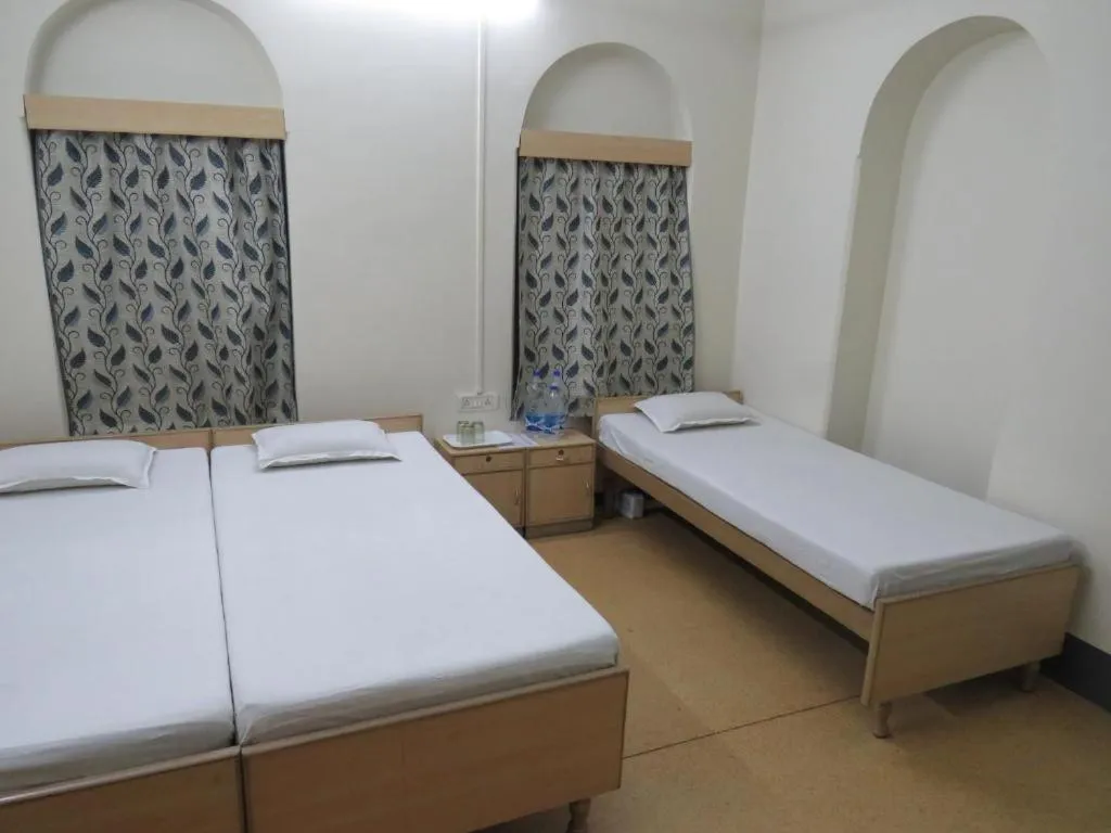 Bed in Shaw Guest House