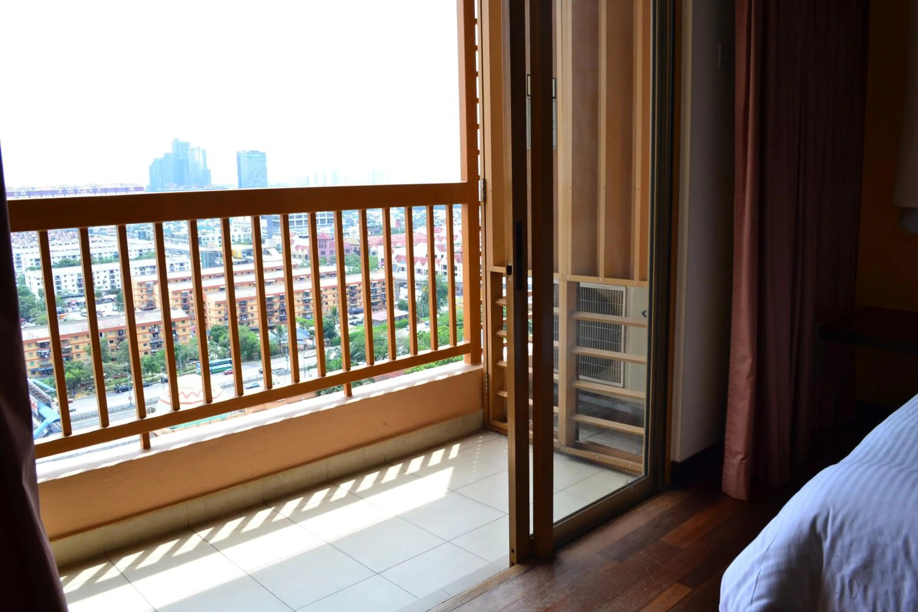 Balcony/Terrace, Bed in Resort Suites at Bandar Sunway