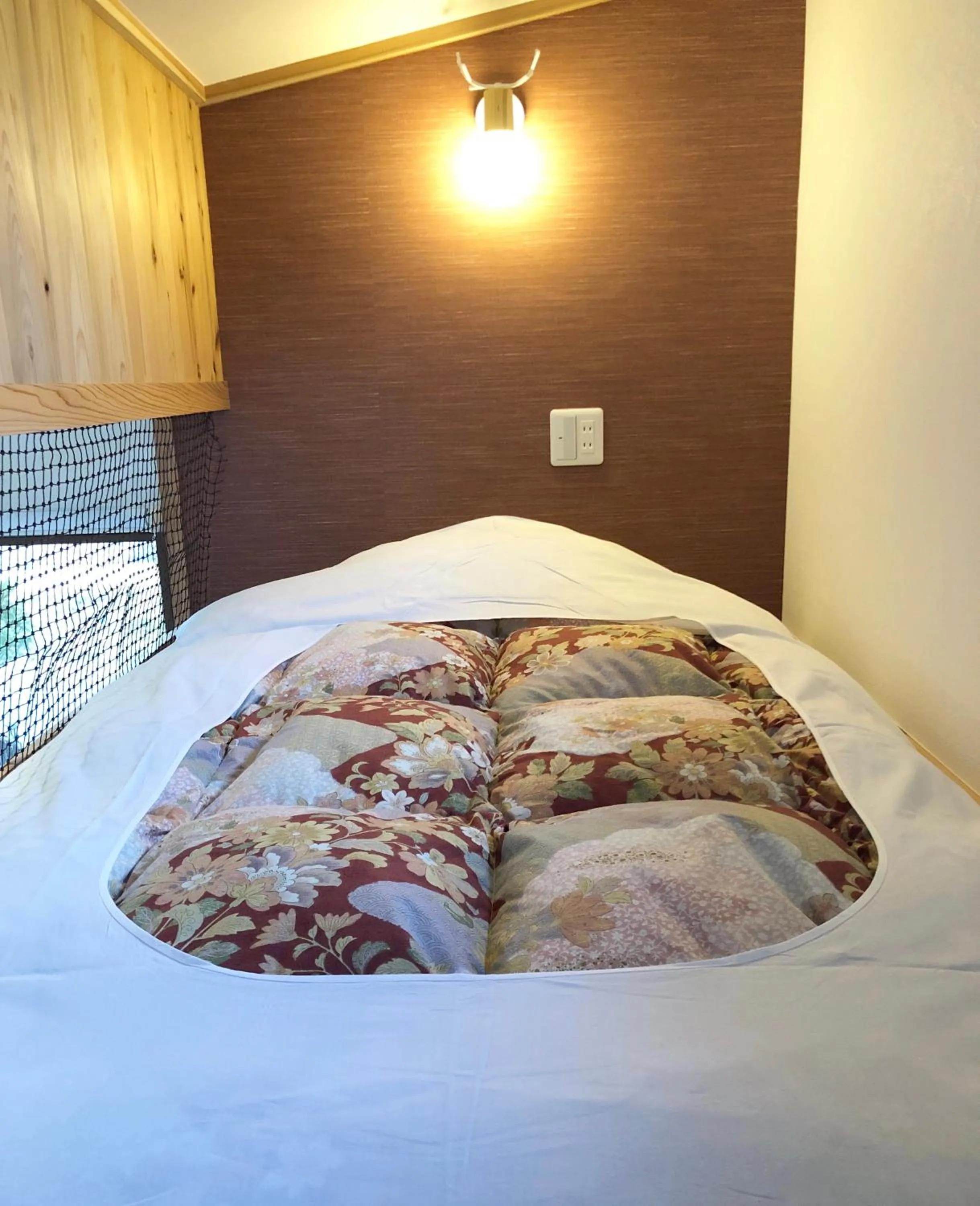 Bed in Stay Nikko Guesthouse