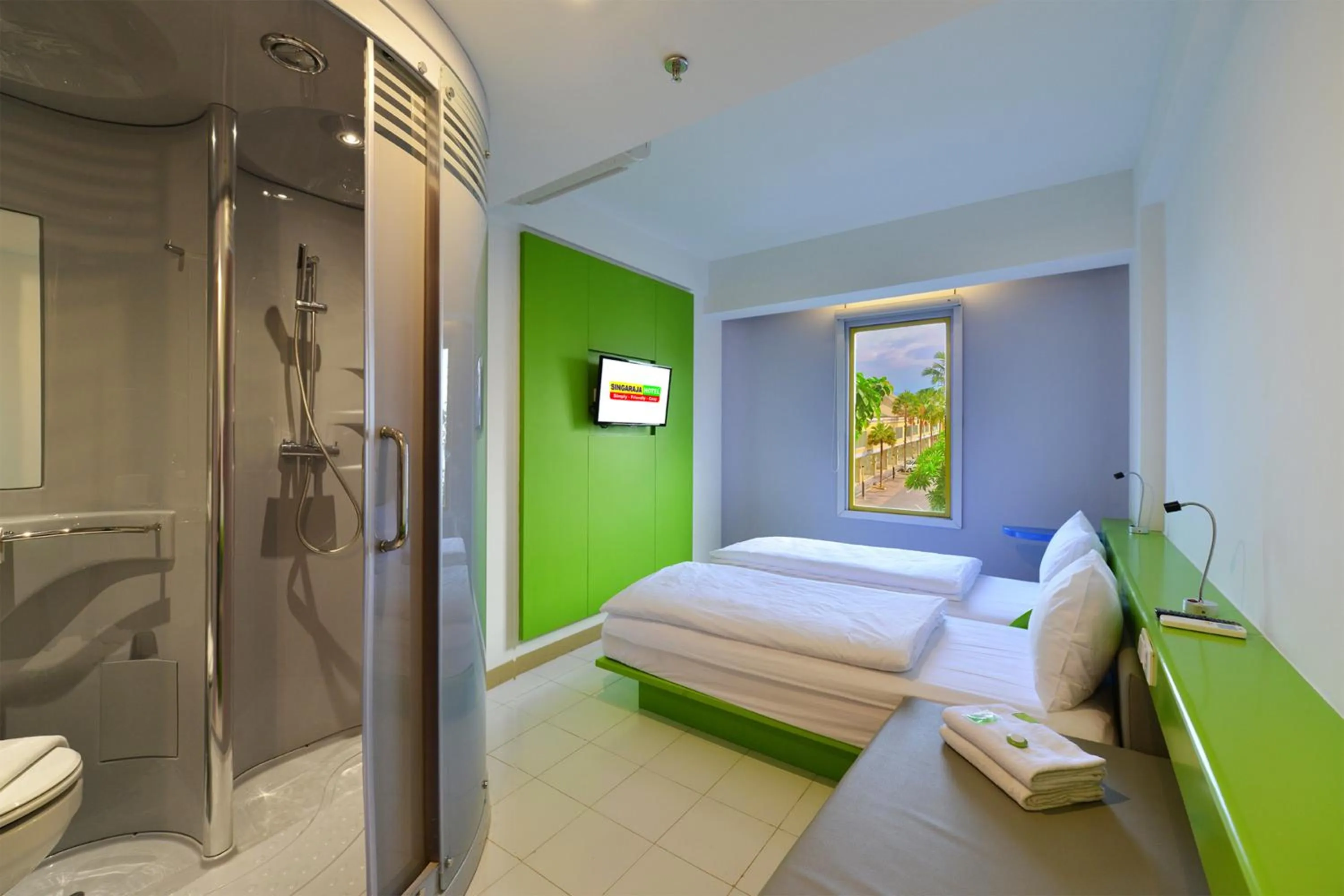 Photo of the whole room, Bed in Singaraja Beach Hotel