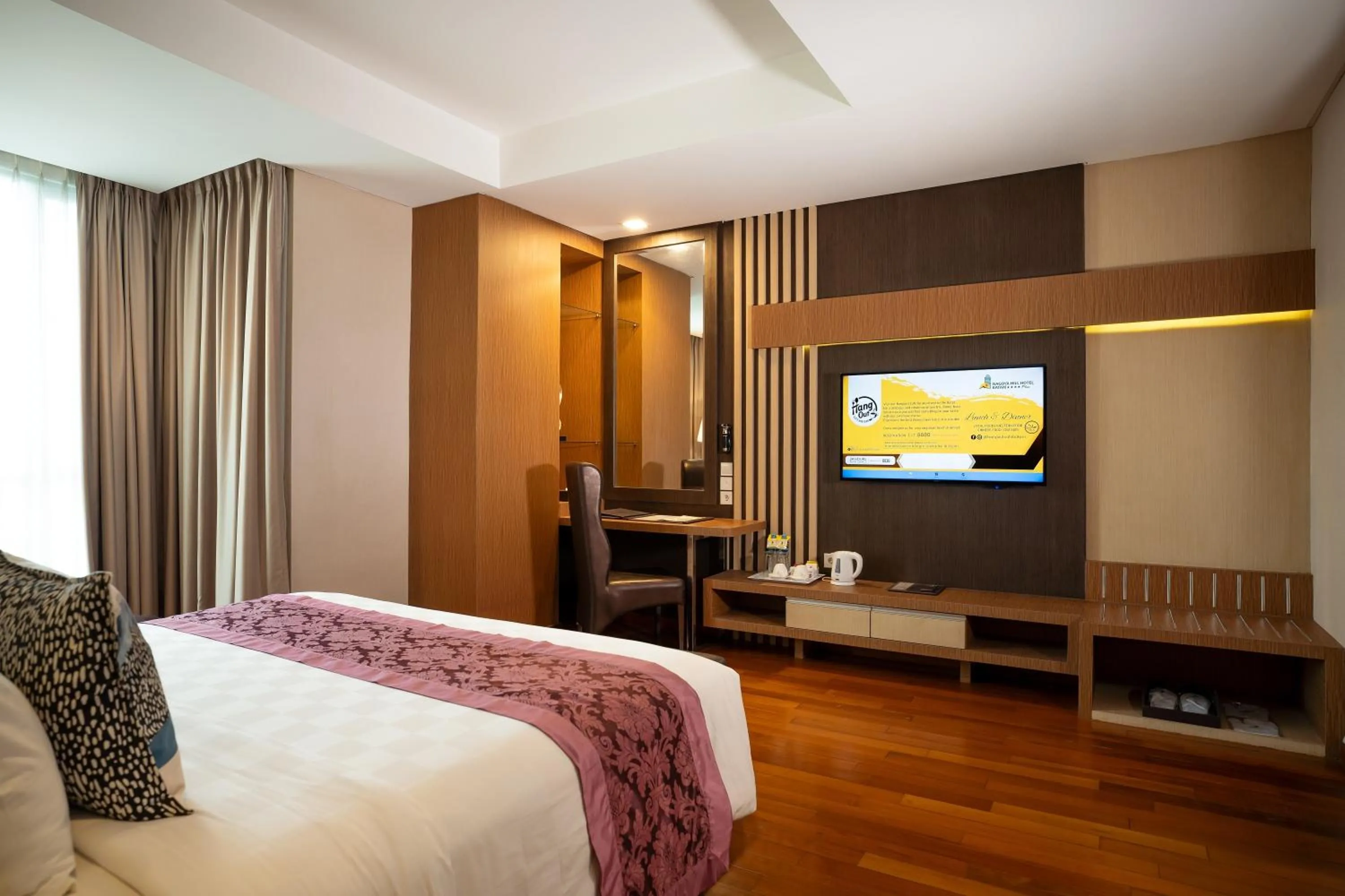 Bed in Nagoya Hill Hotel Batam