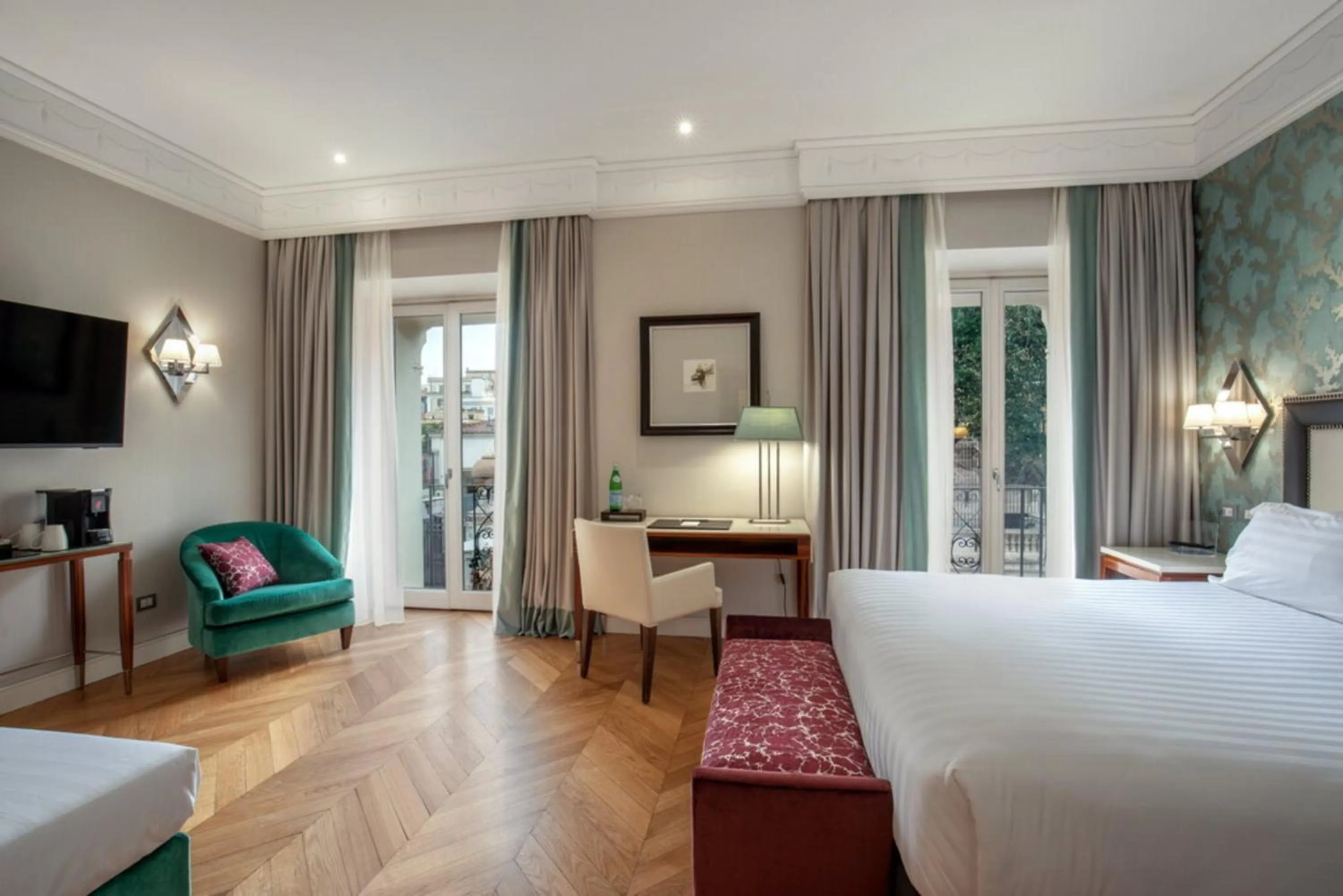 Bed in Rose Garden Palace Roma by OMNIA hotels