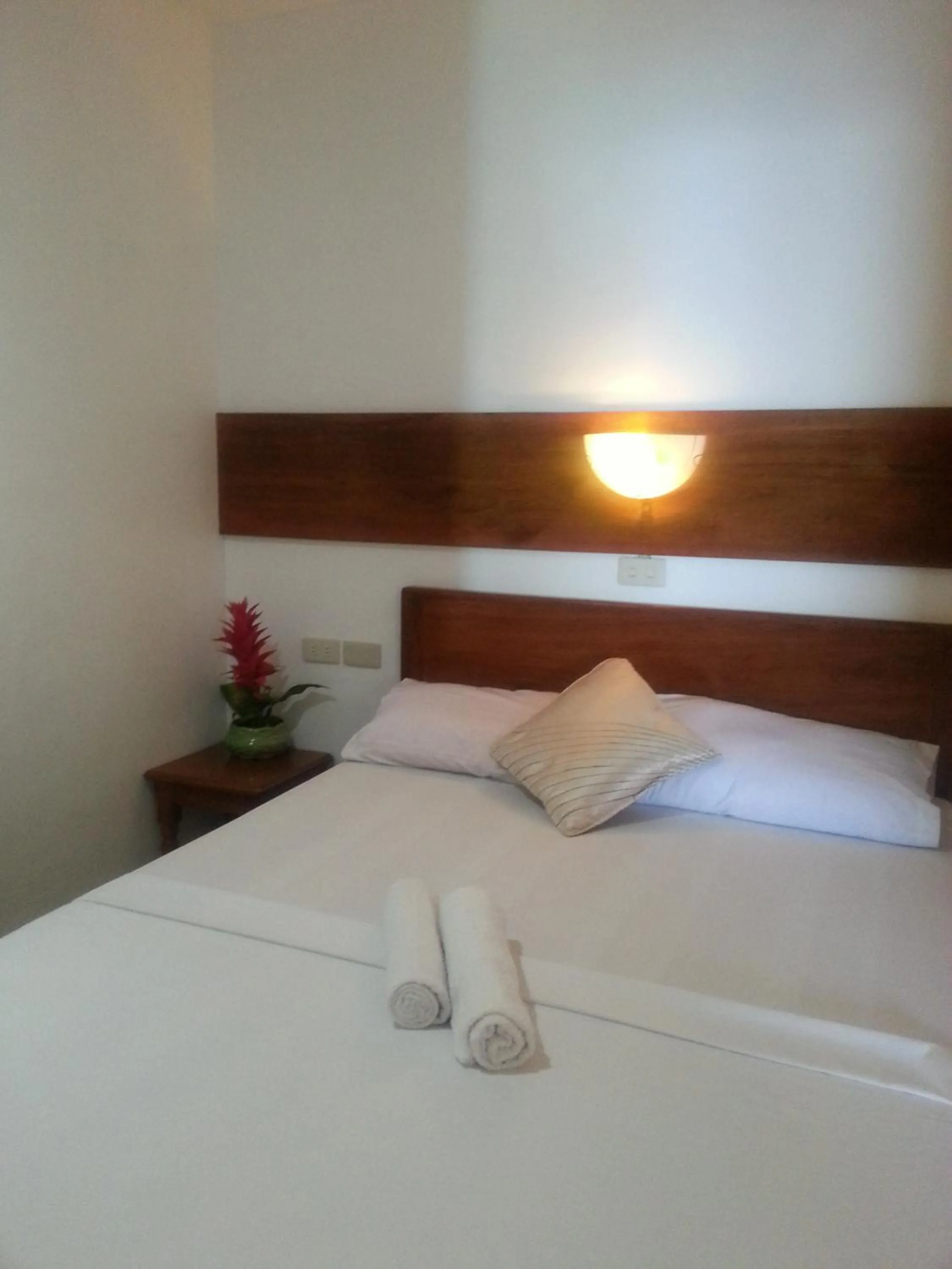 Bed in La Casa Teresa Tourist Inn Inc