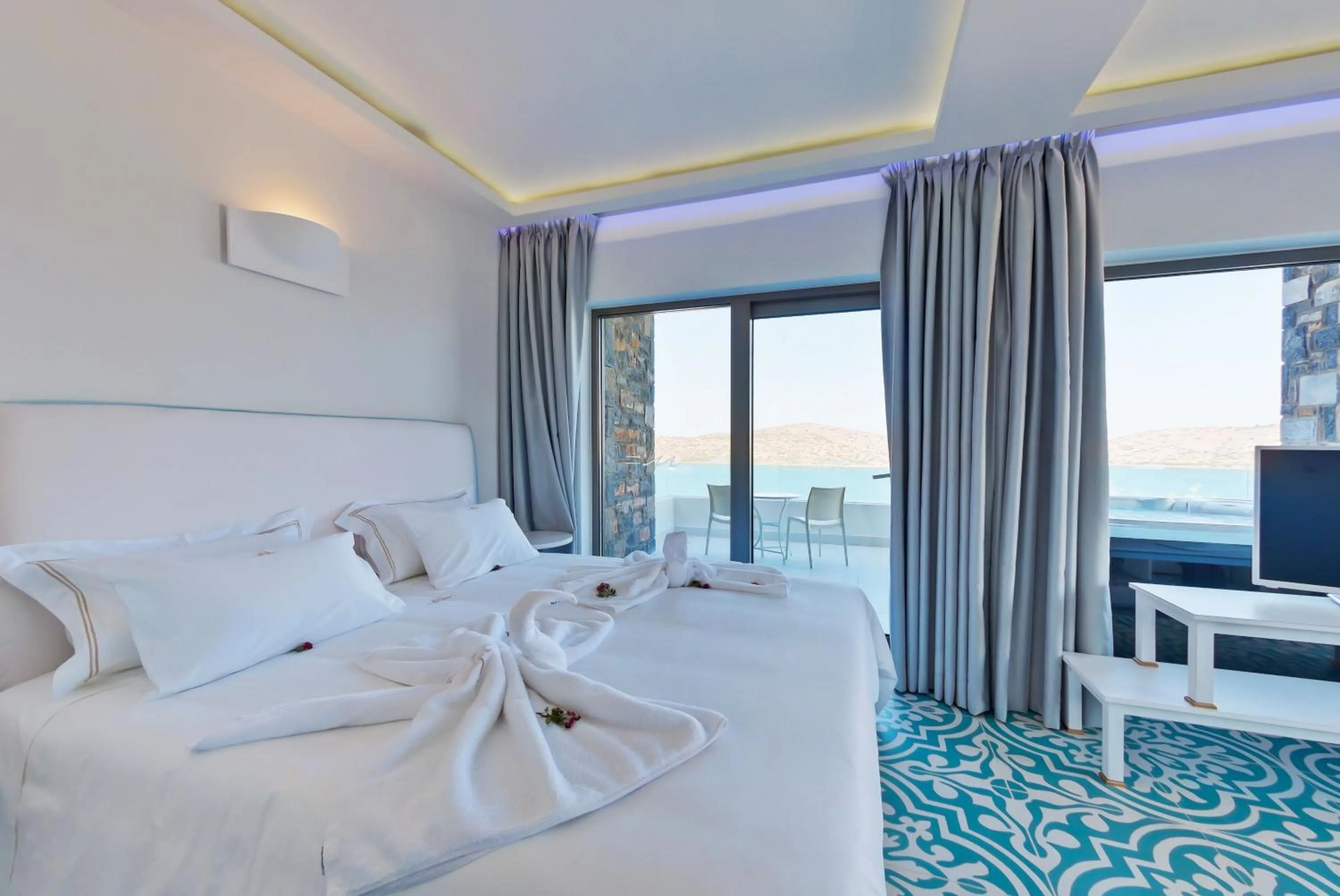 Bed in Royal Marmin Bay Boutique & Art Hotel