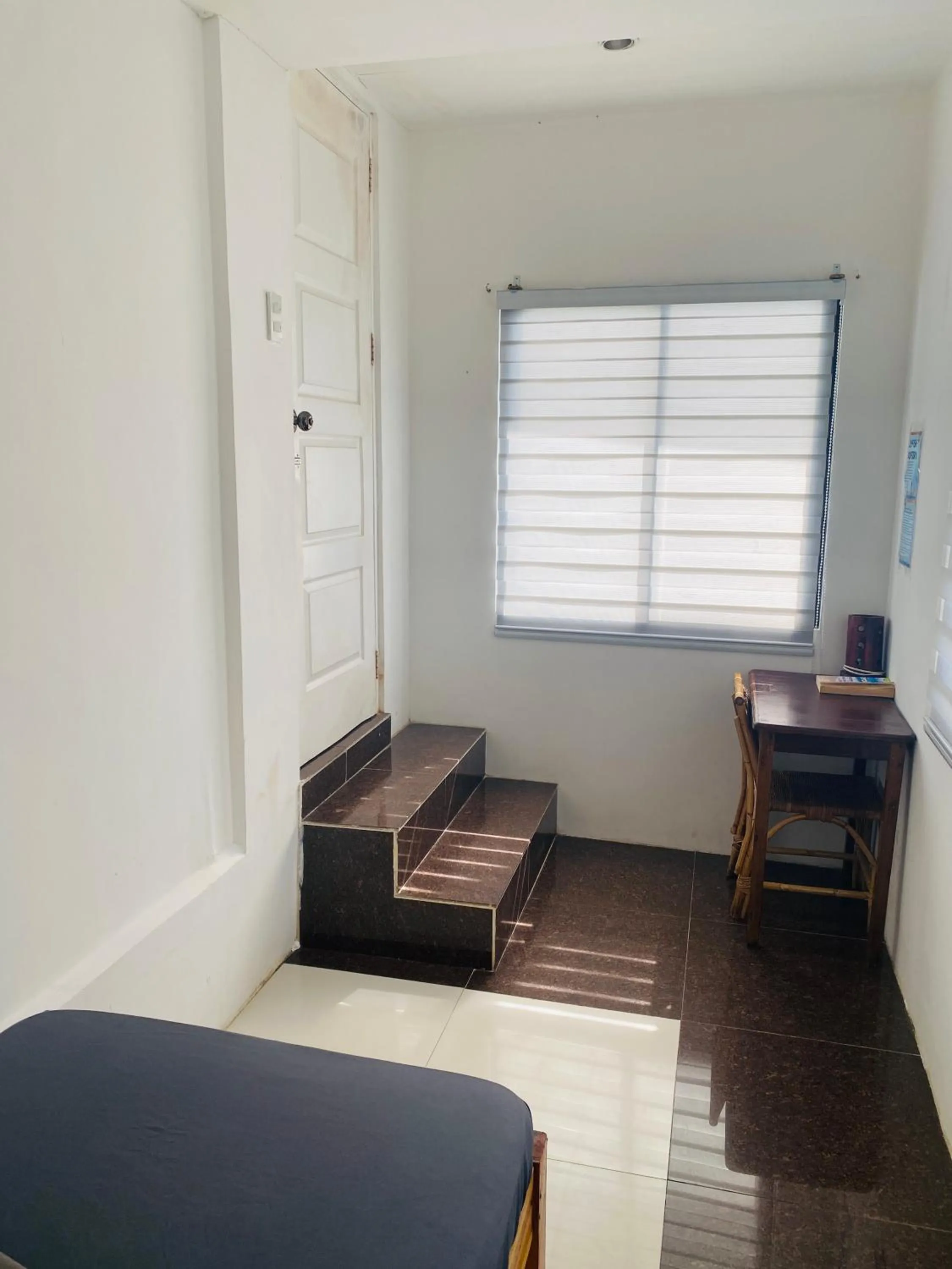 Bed in Raje Residence