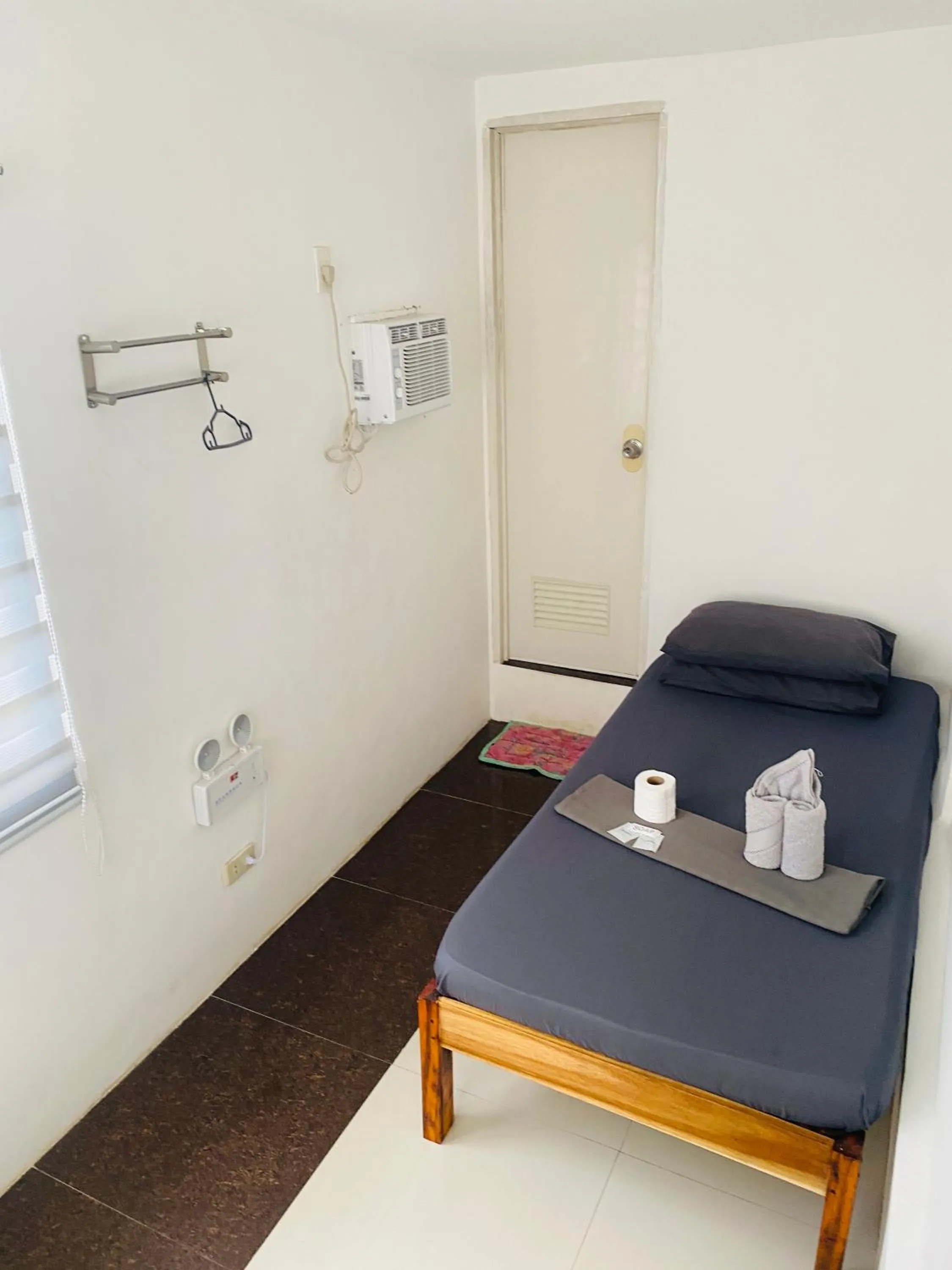 Bed in Raje Residence