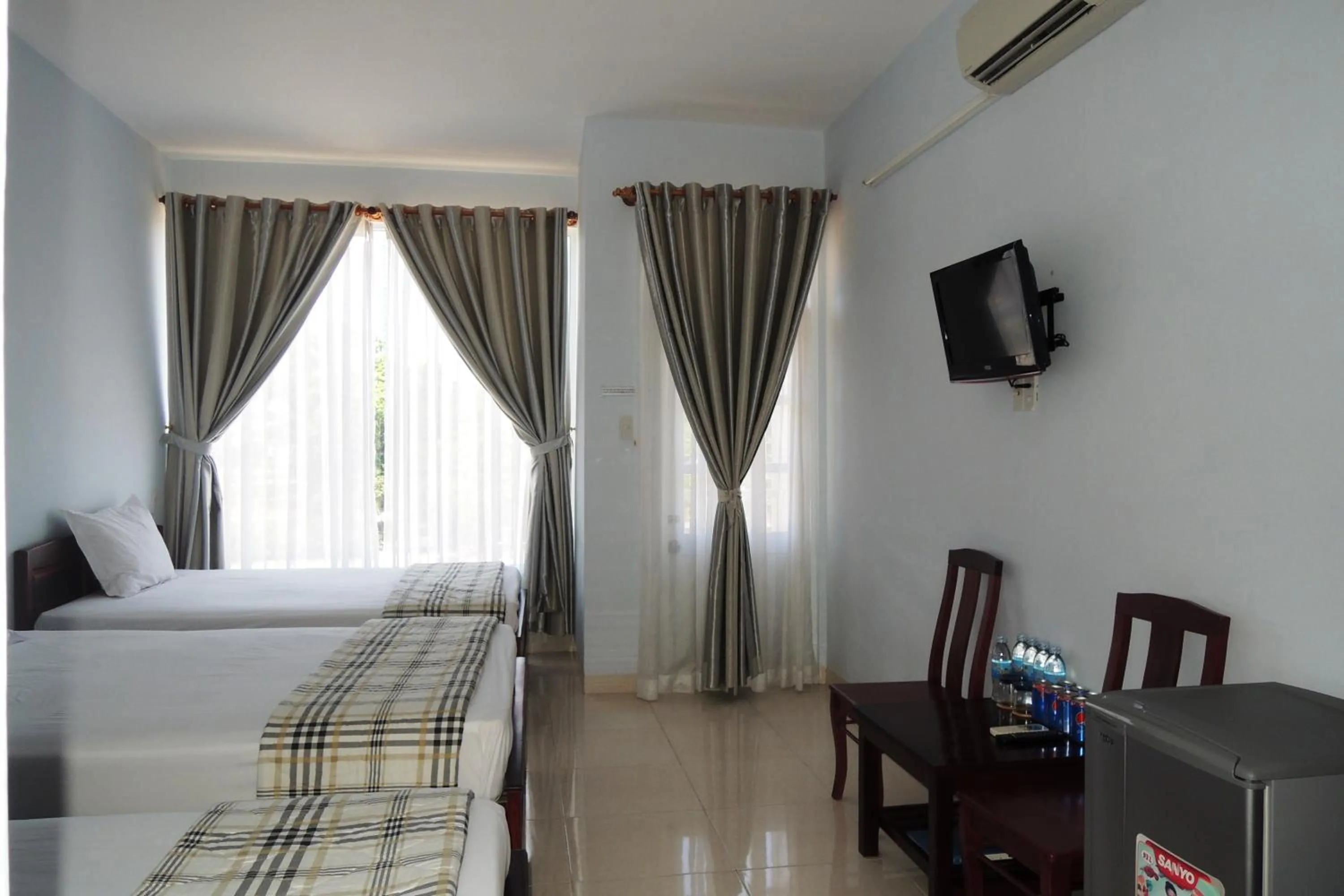 Photo of the whole room in Quang Nhat Hotel