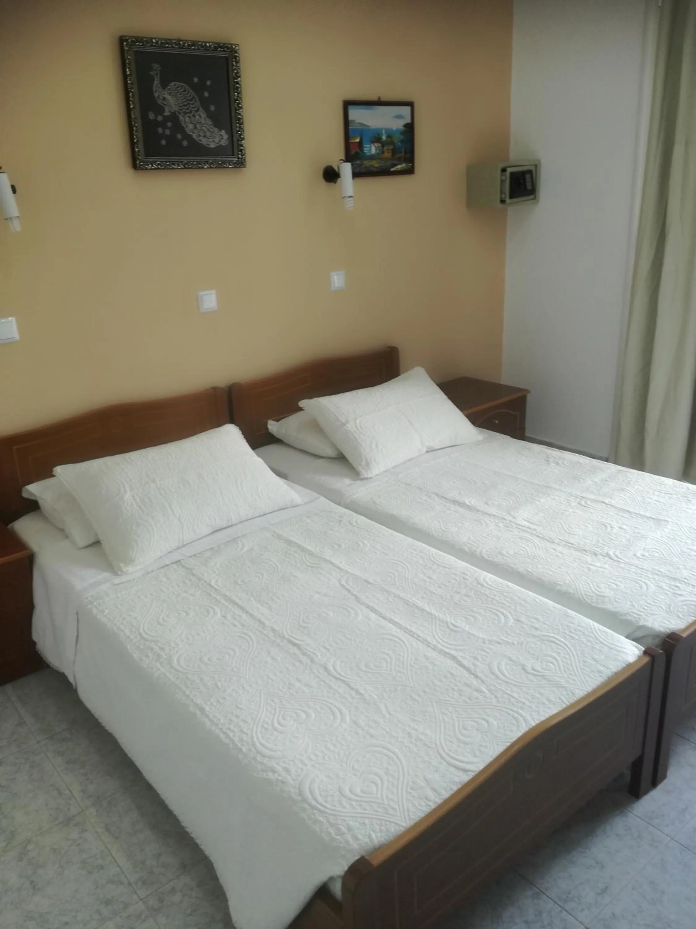 Bed in Hotel Dimitra Sun