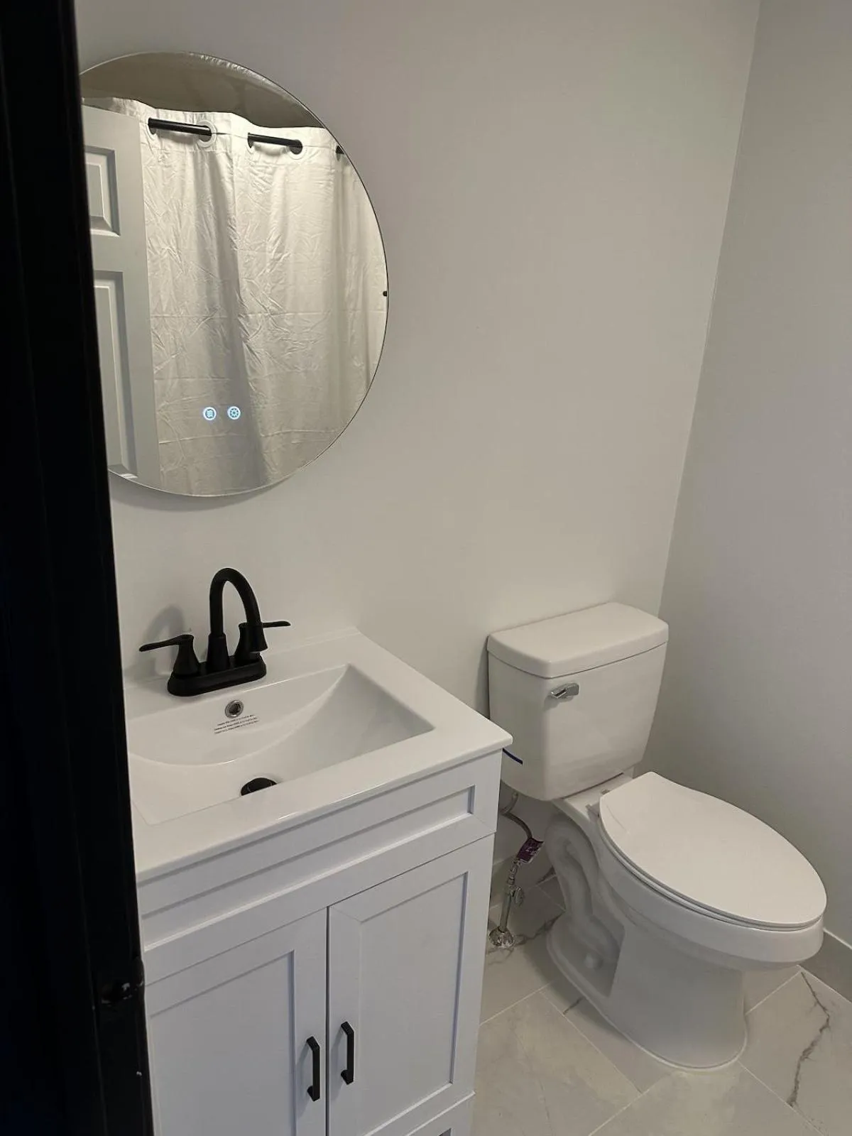 Toilet in Harborside Suites