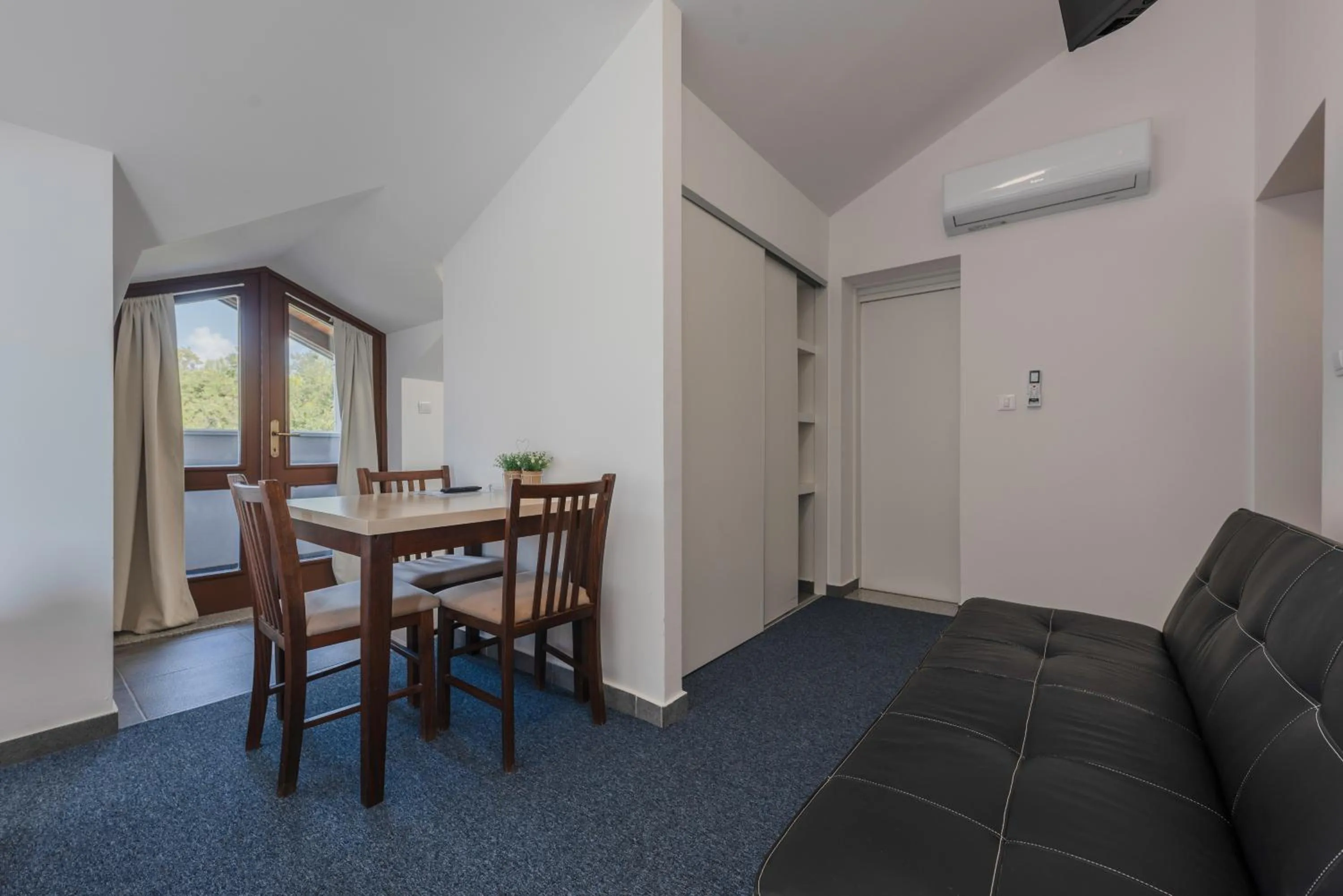 Seating area in Aparthotel Plat