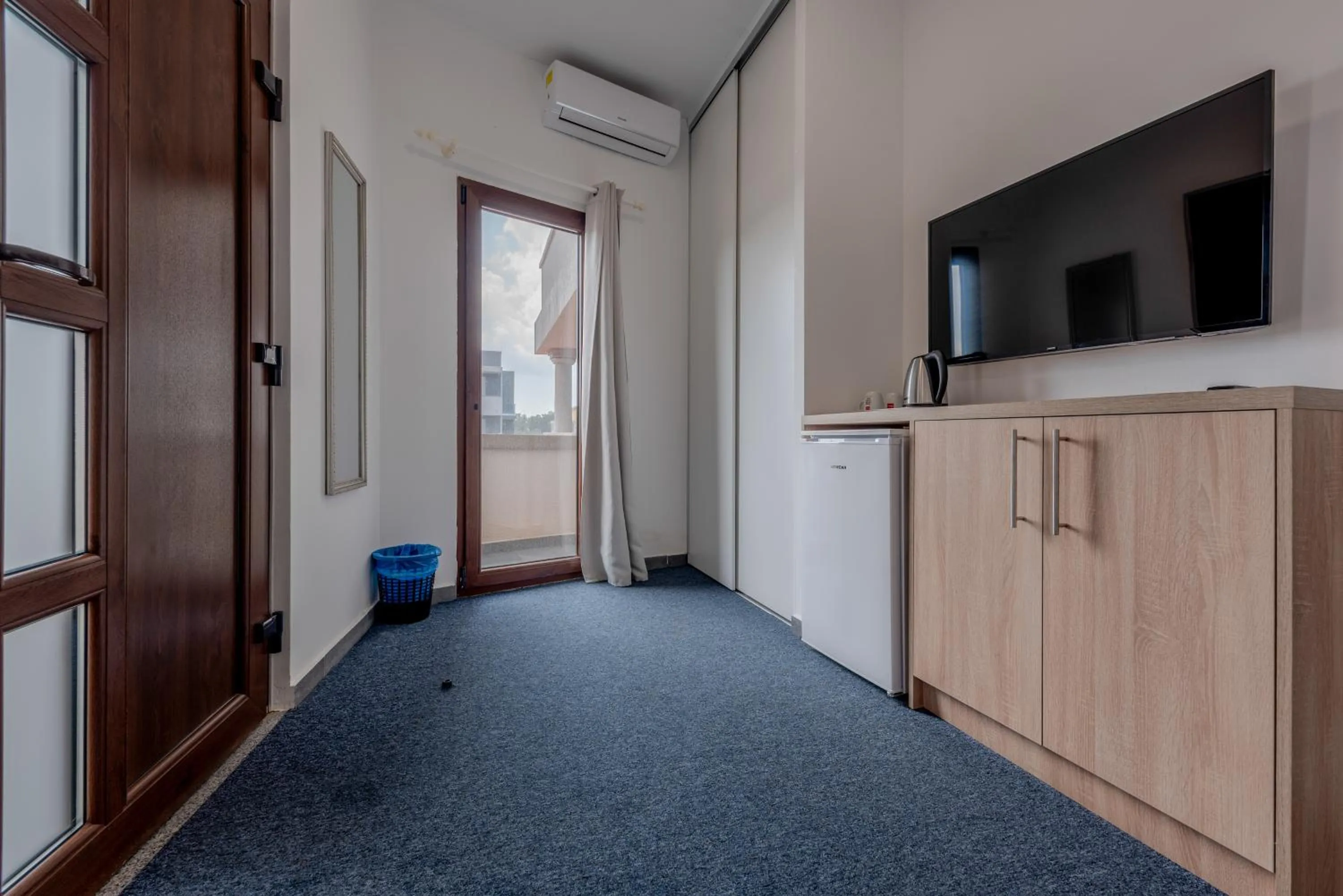 TV and multimedia in Aparthotel Plat