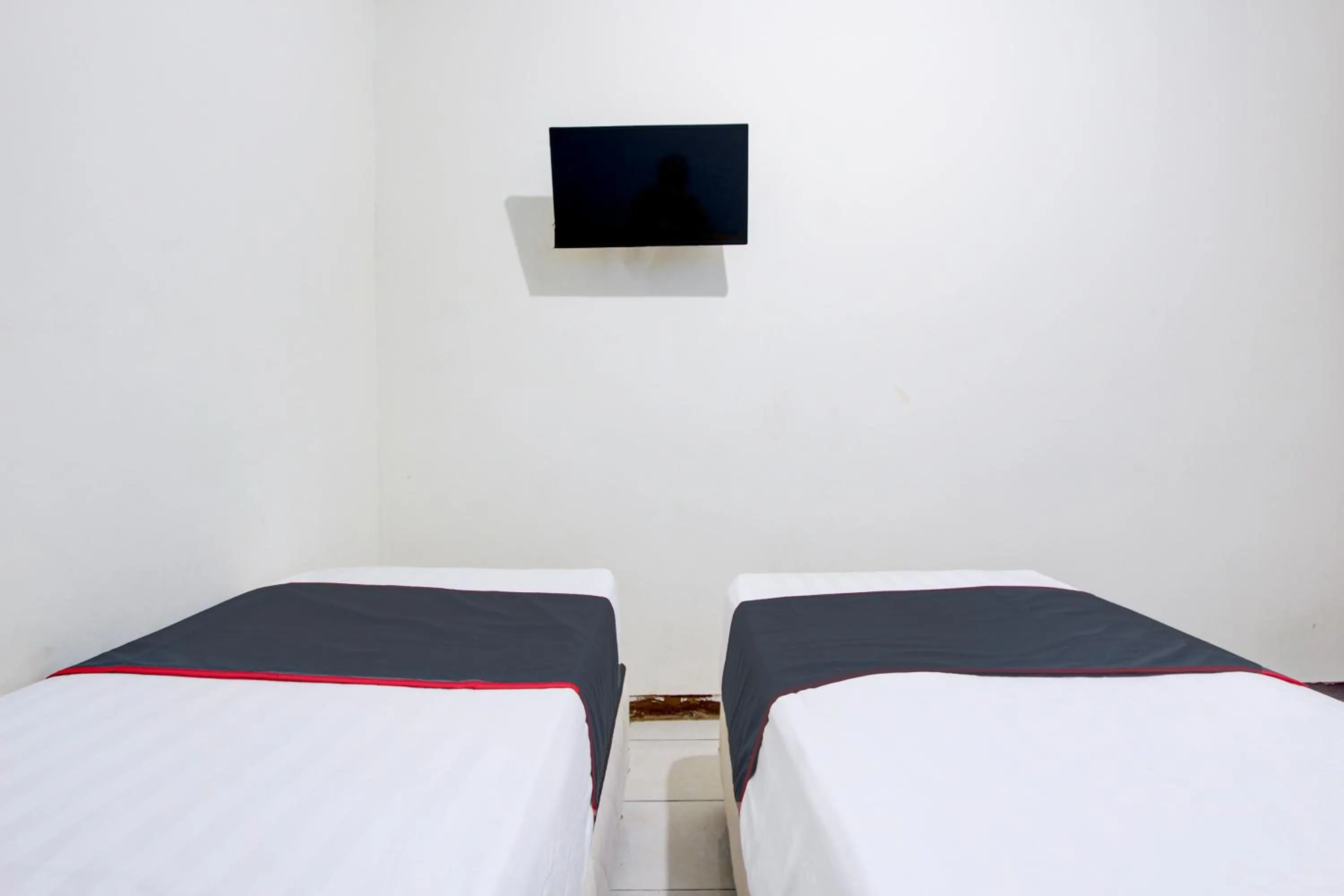 Bedroom in Hotel O Semarang near Kota Lama Semarang formerly Kamarkoe Residence