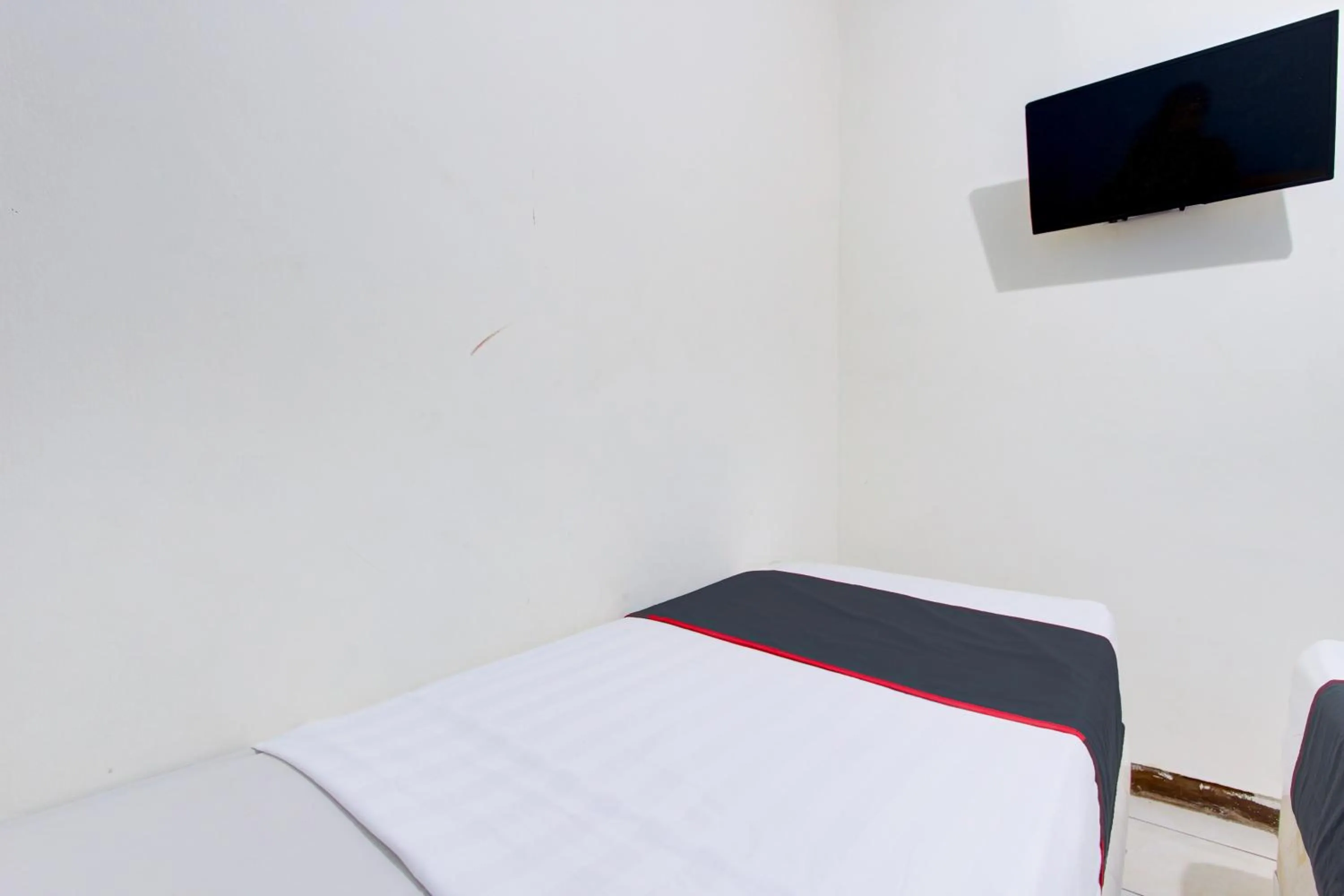 Bedroom in Hotel O Semarang near Kota Lama Semarang formerly Kamarkoe Residence