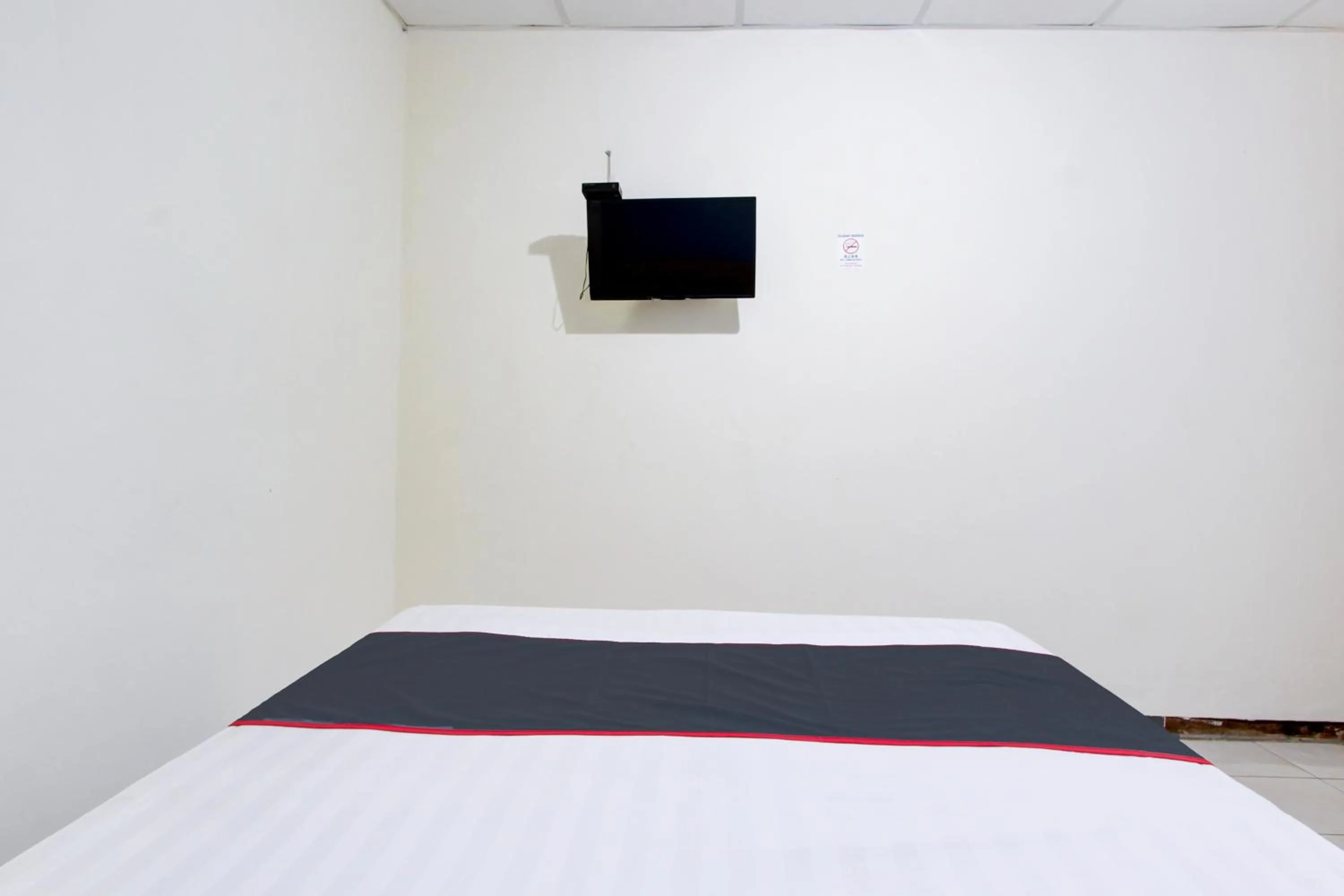 Bedroom in Hotel O Semarang near Kota Lama Semarang formerly Kamarkoe Residence