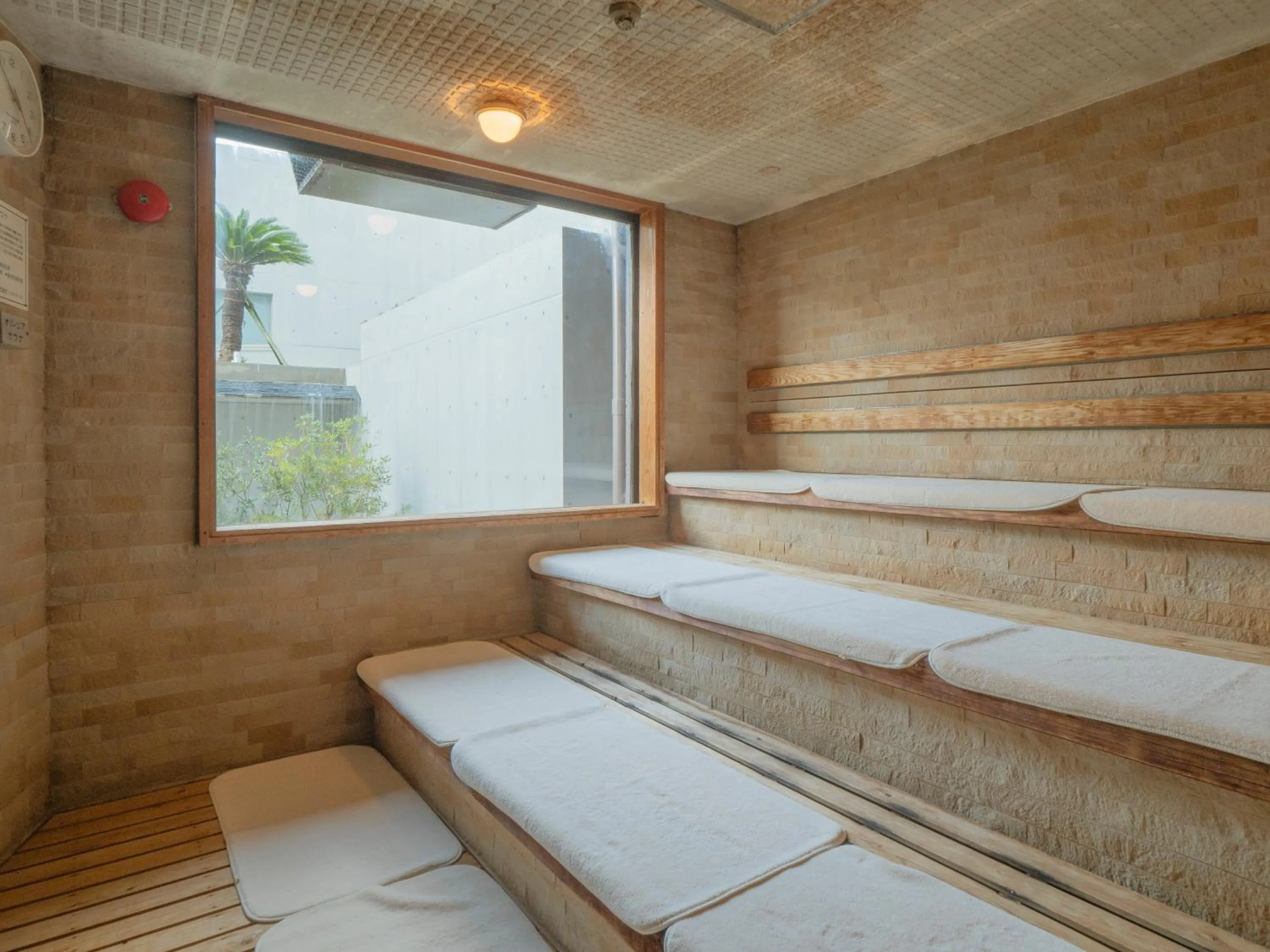 Bed in THE HOTEL YAKUSHIMA ocean & forest