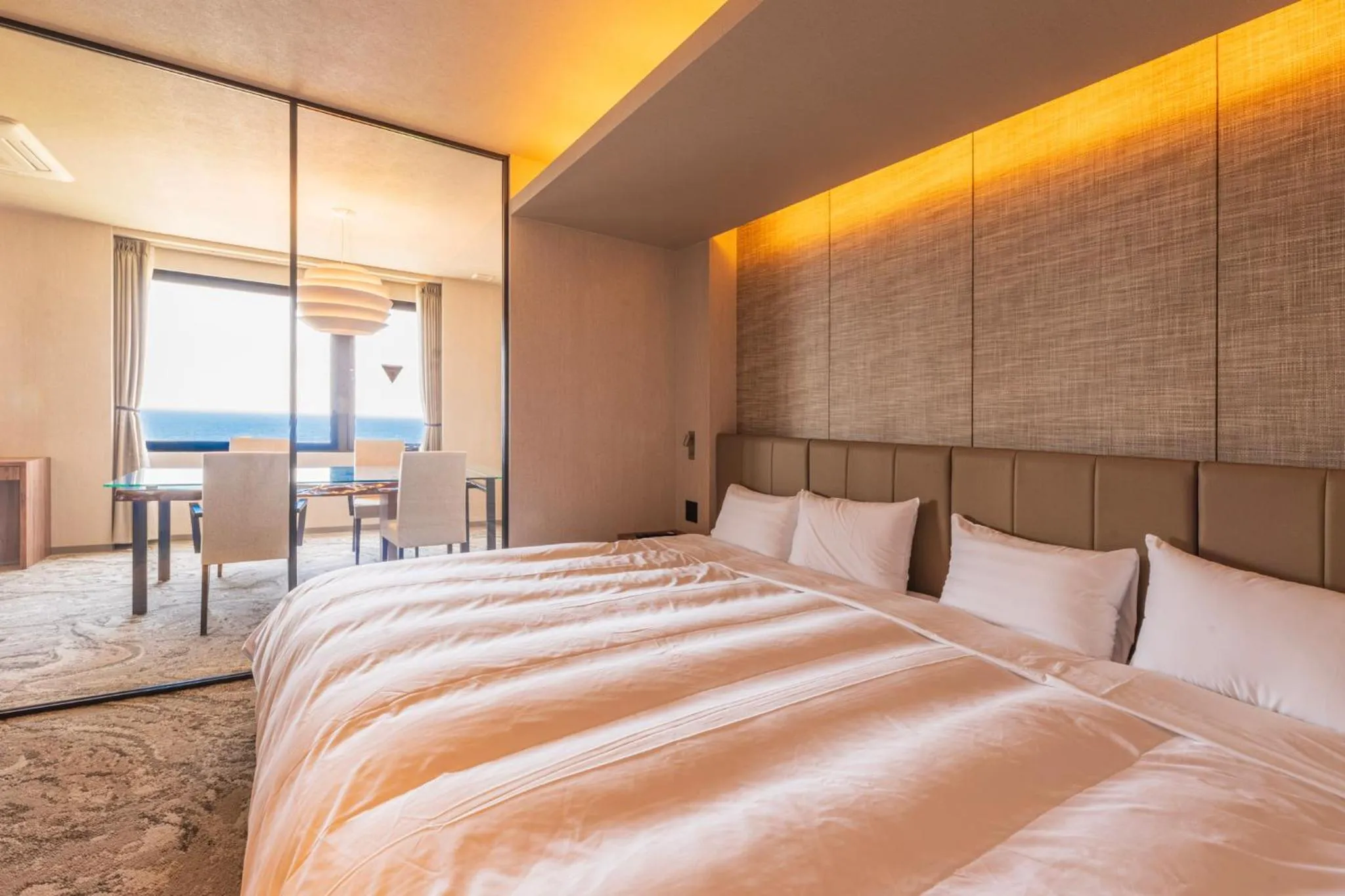 Bed in THE HOTEL YAKUSHIMA ocean & forest