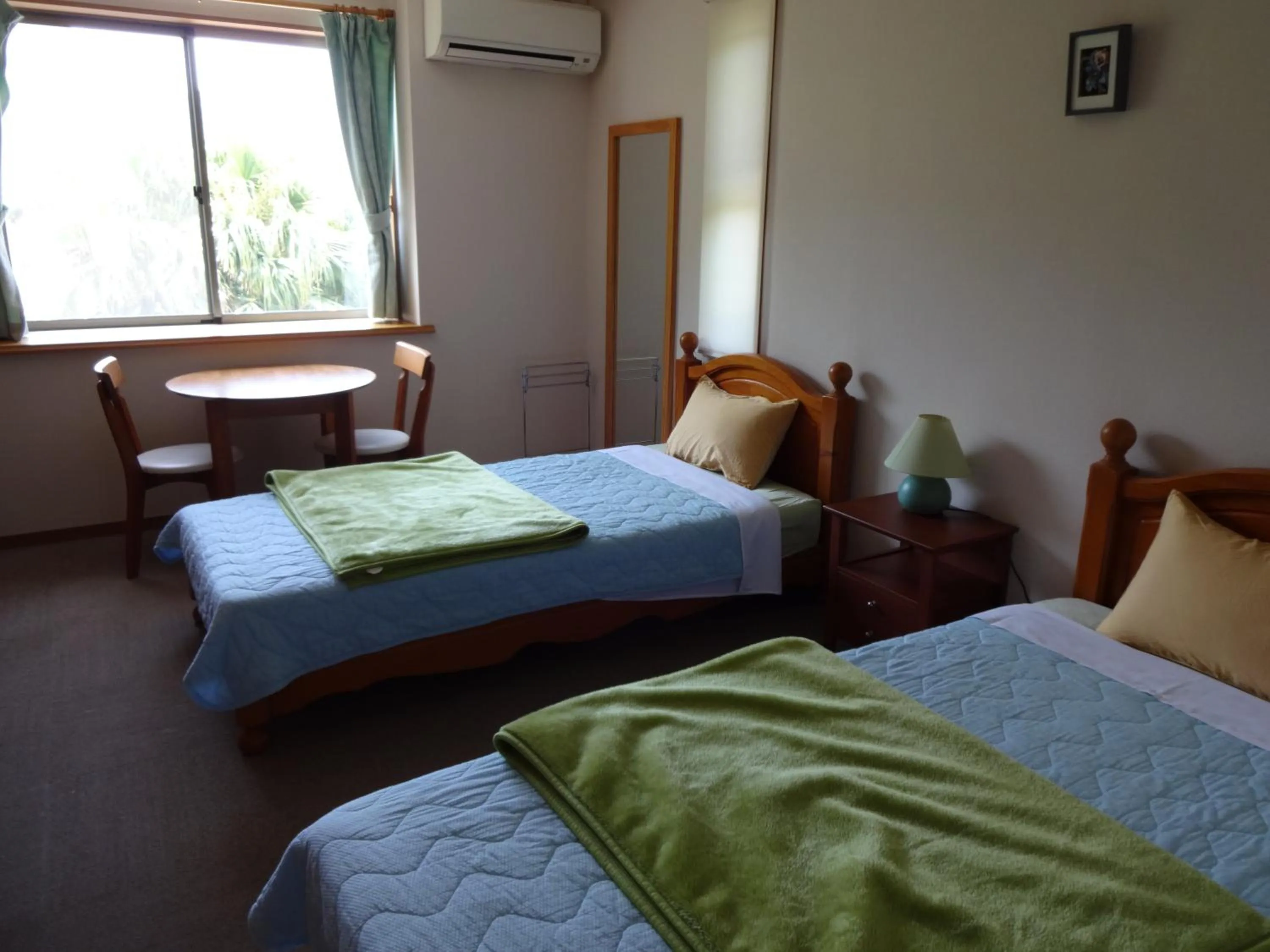 Photo of the whole room, Bed in Mantenbo