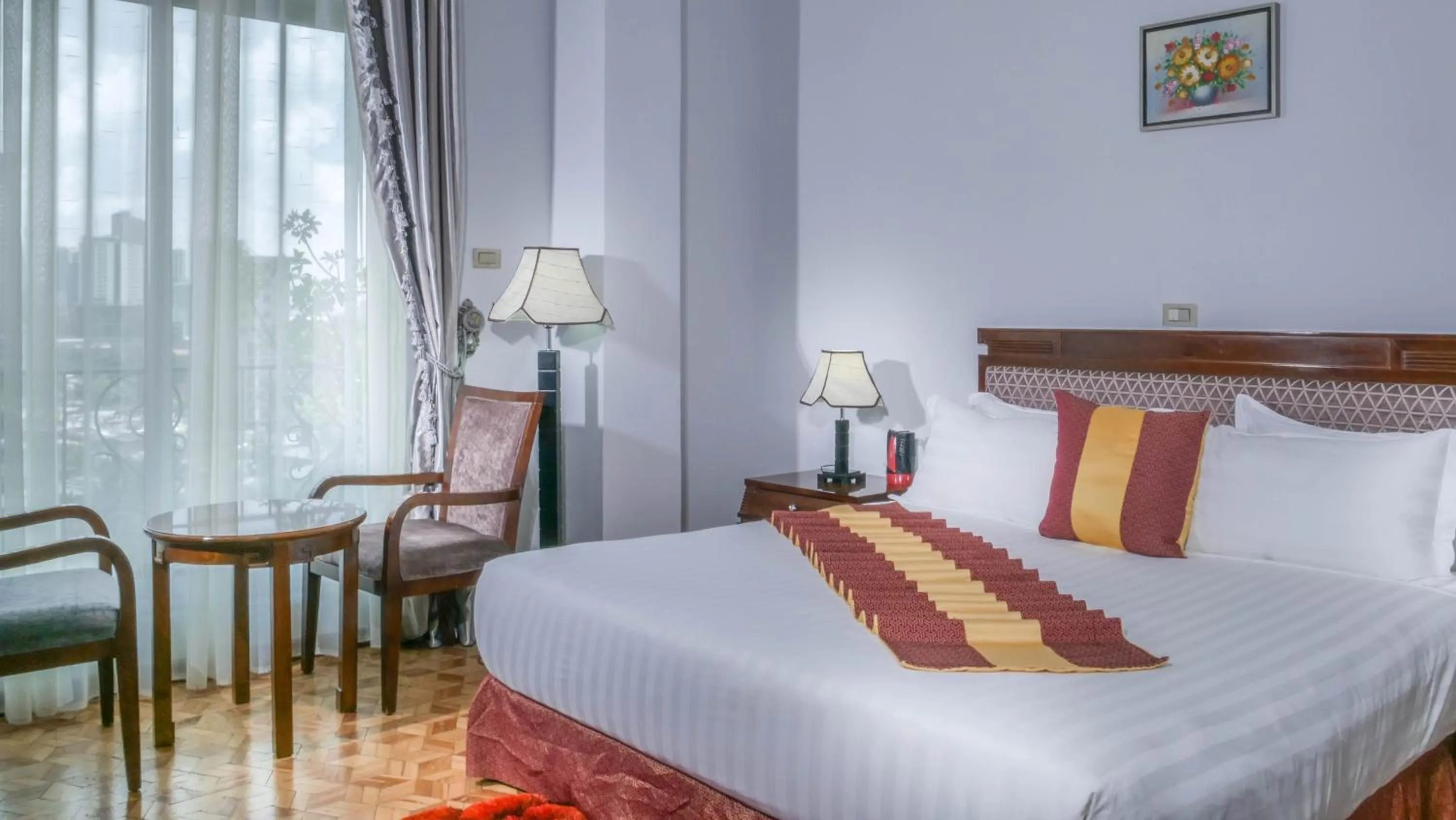 Bed in Tirar International Hotel