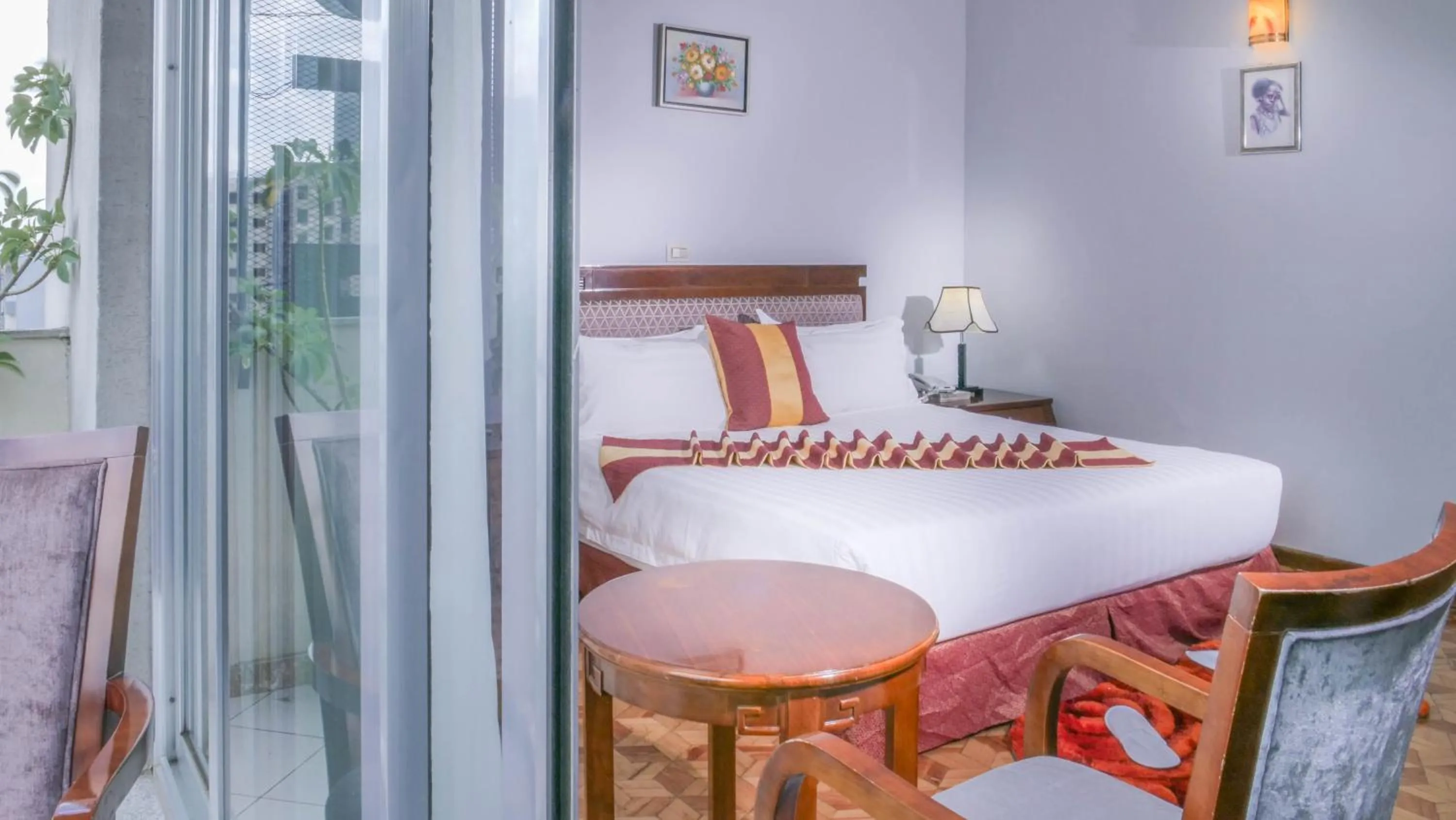 Bed in Tirar International Hotel