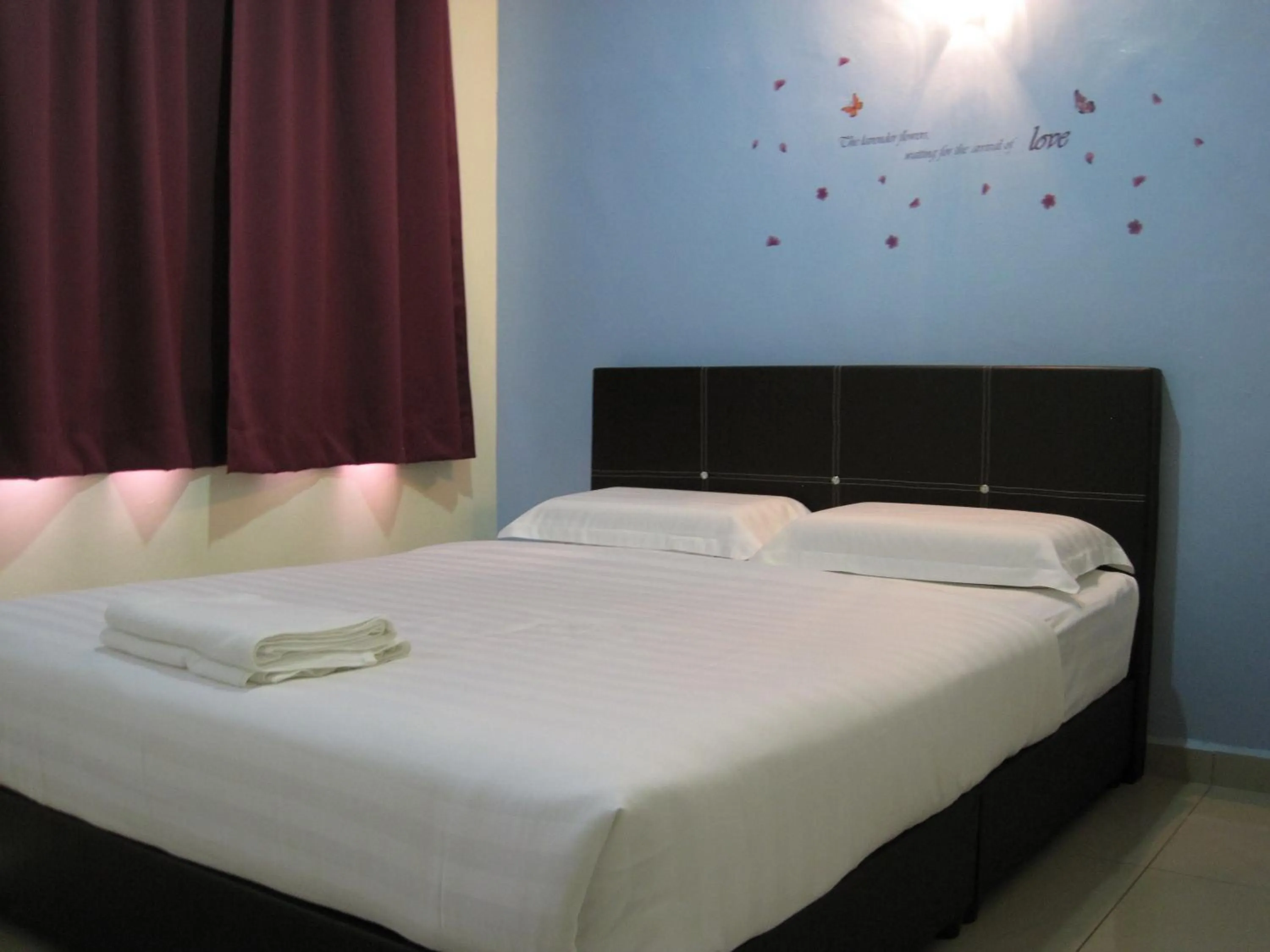 Photo of the whole room, Bed in Max Inn Hotel