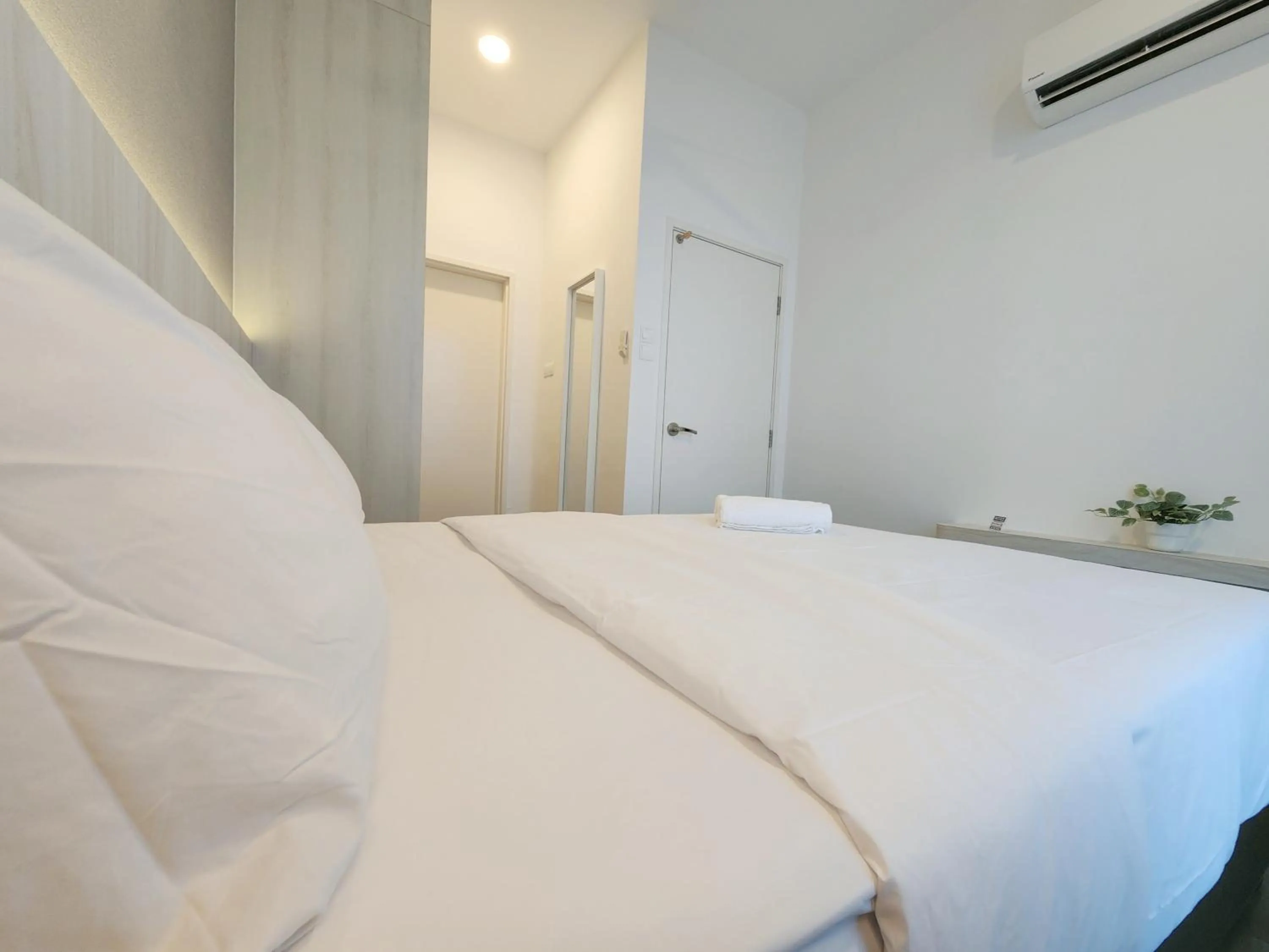 Bed in SKS Pavillion Suites