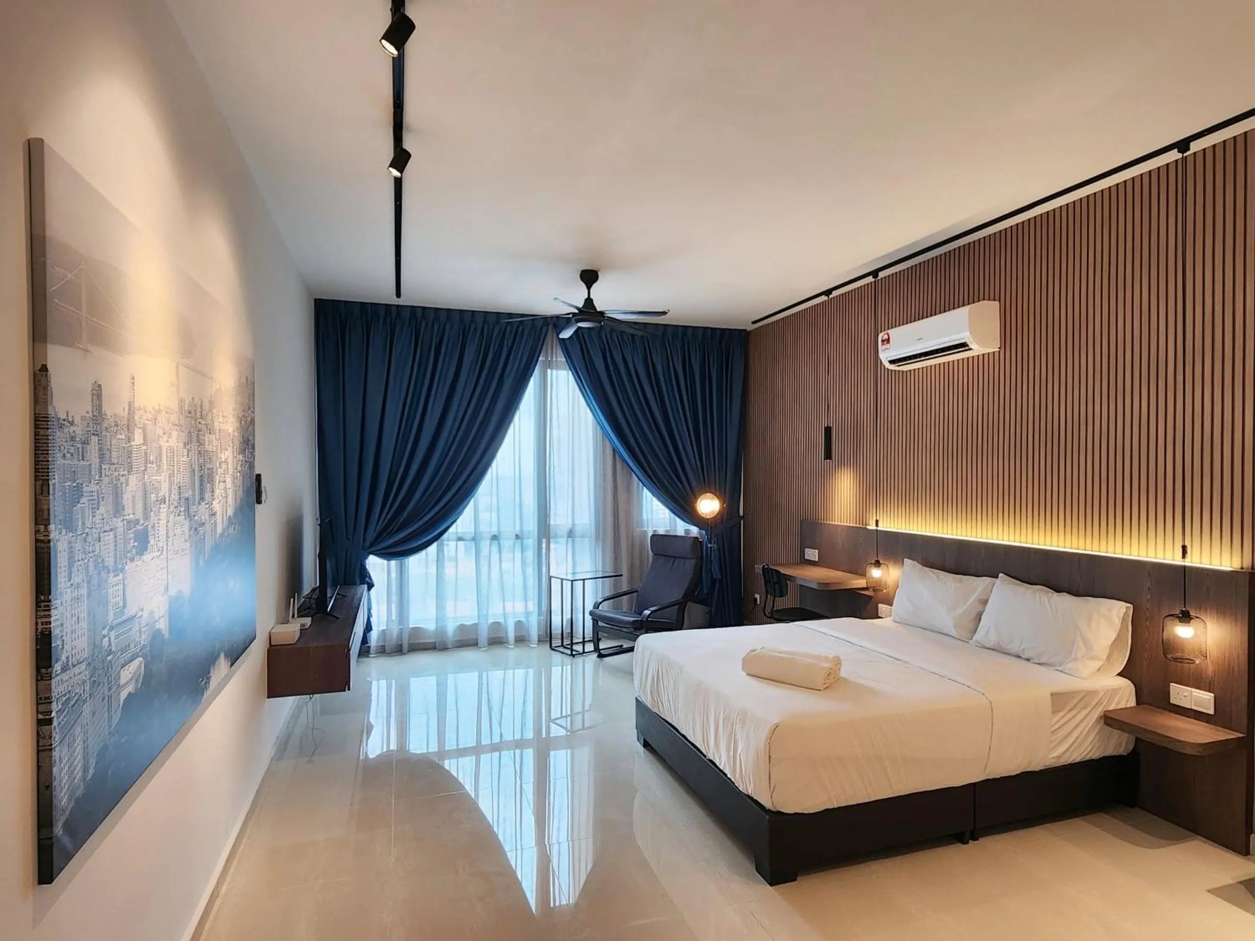 Bed in SKS Pavillion Suites