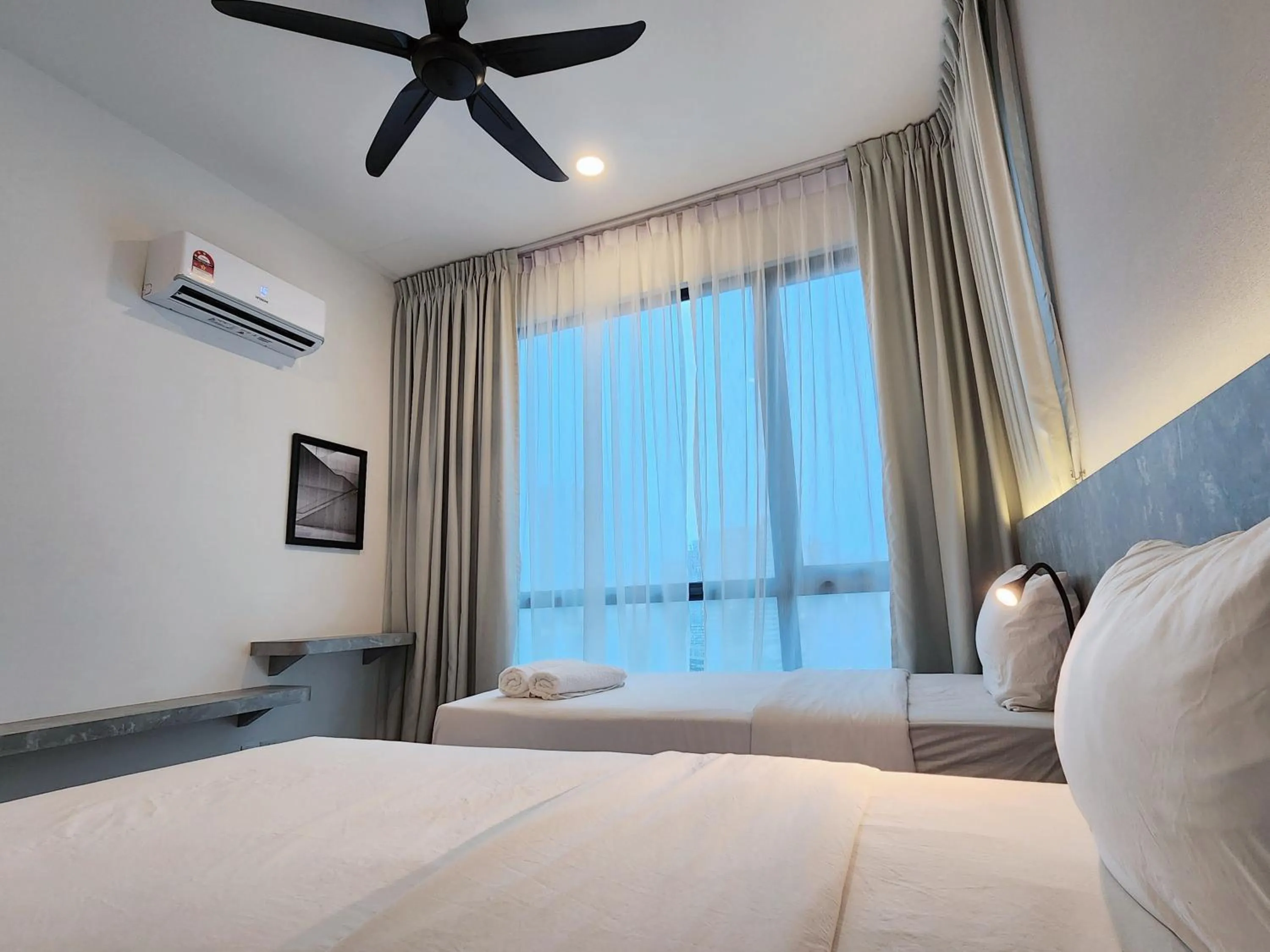 Bed in SKS Pavillion Suites