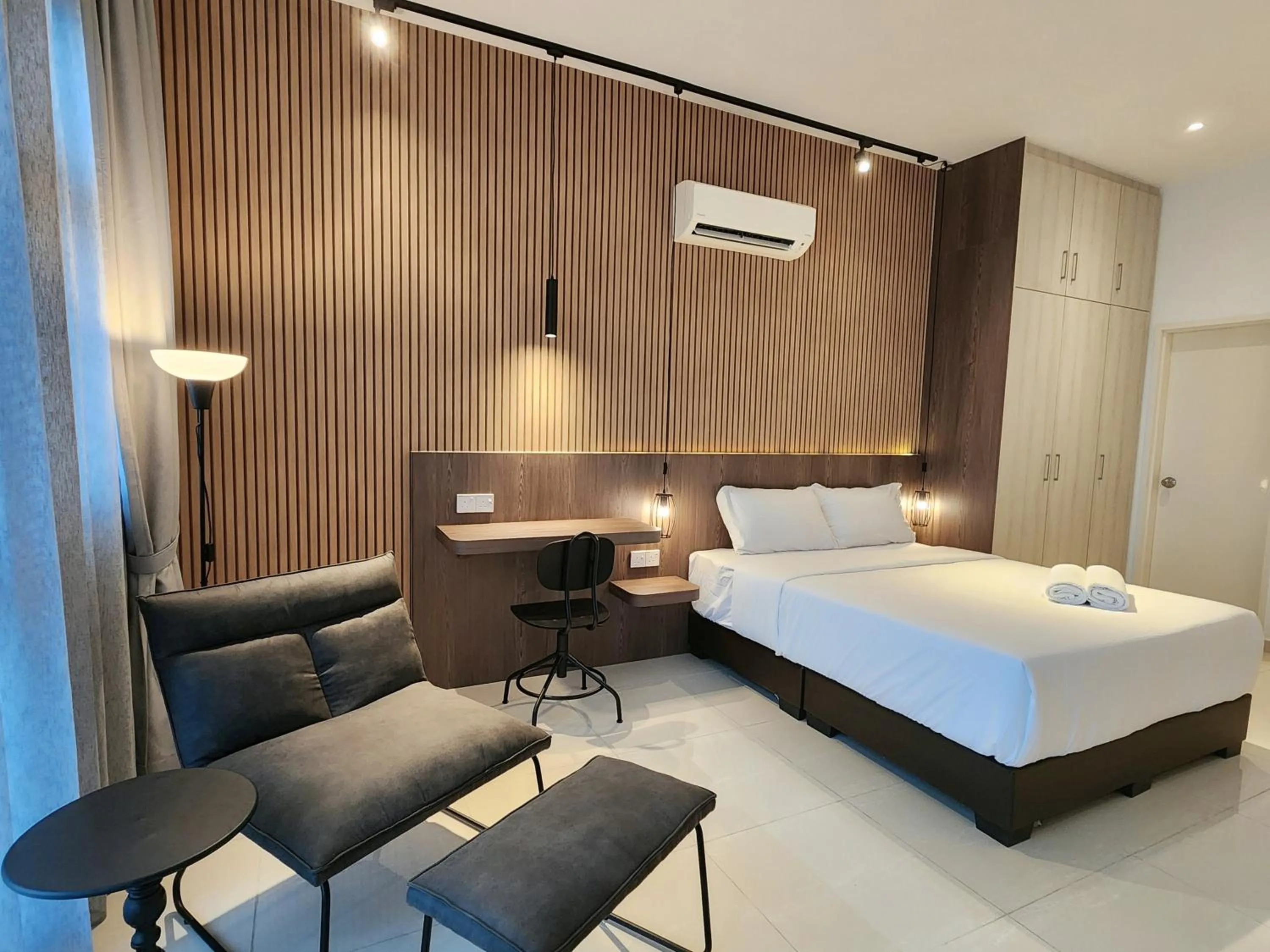 Bed in SKS Pavillion Suites