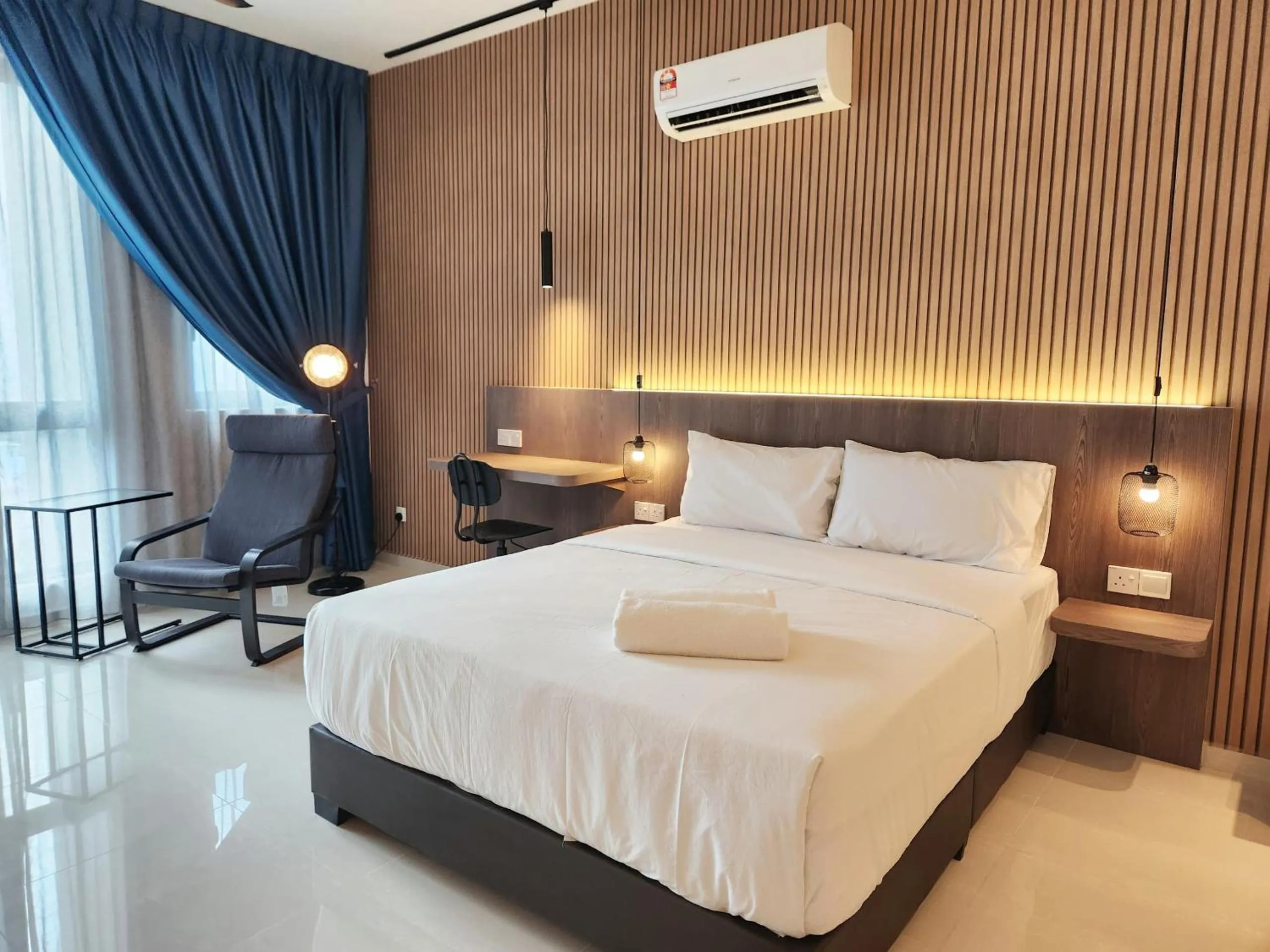 Bed in SKS Pavillion Suites