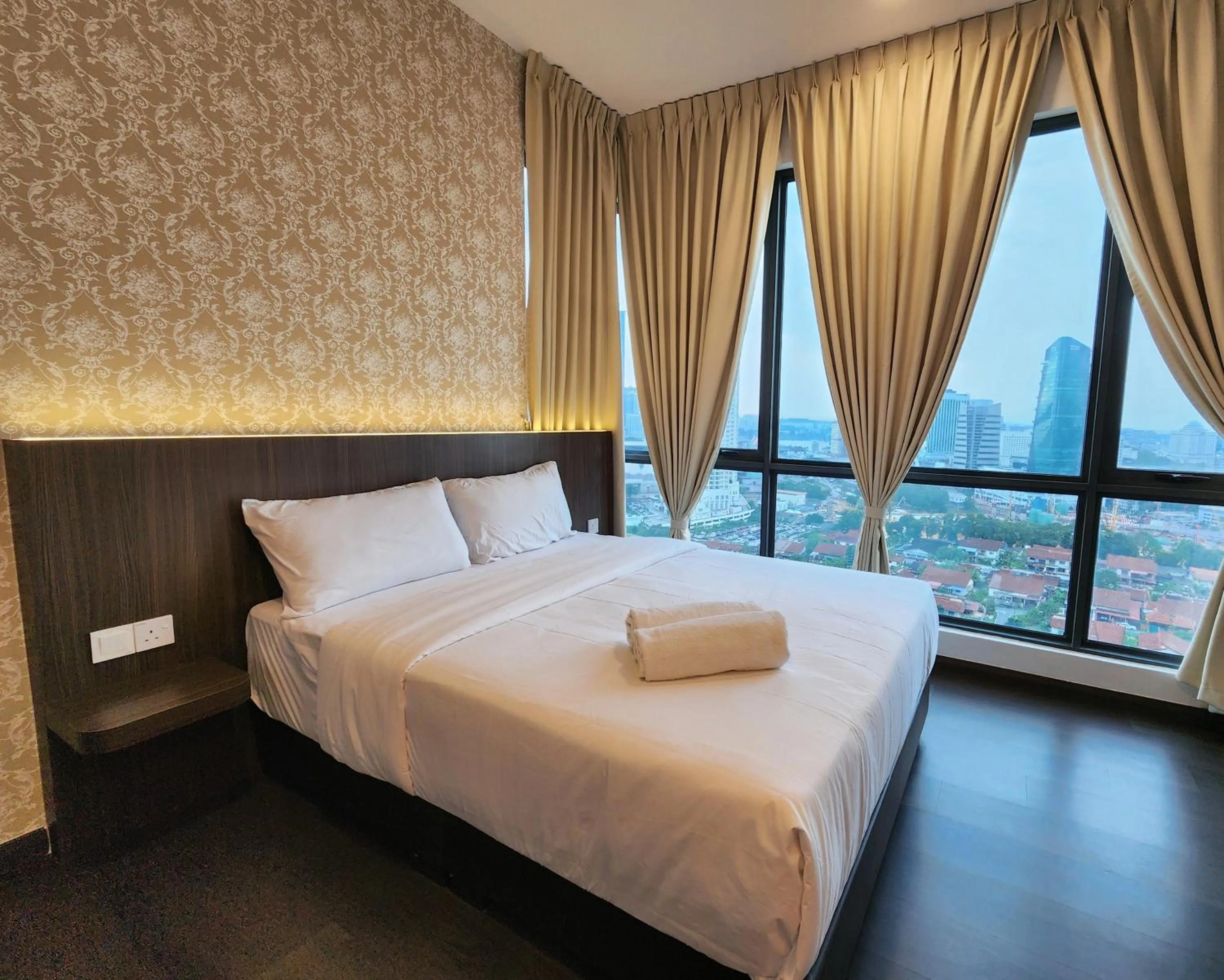 Bed in SKS Pavillion Suites