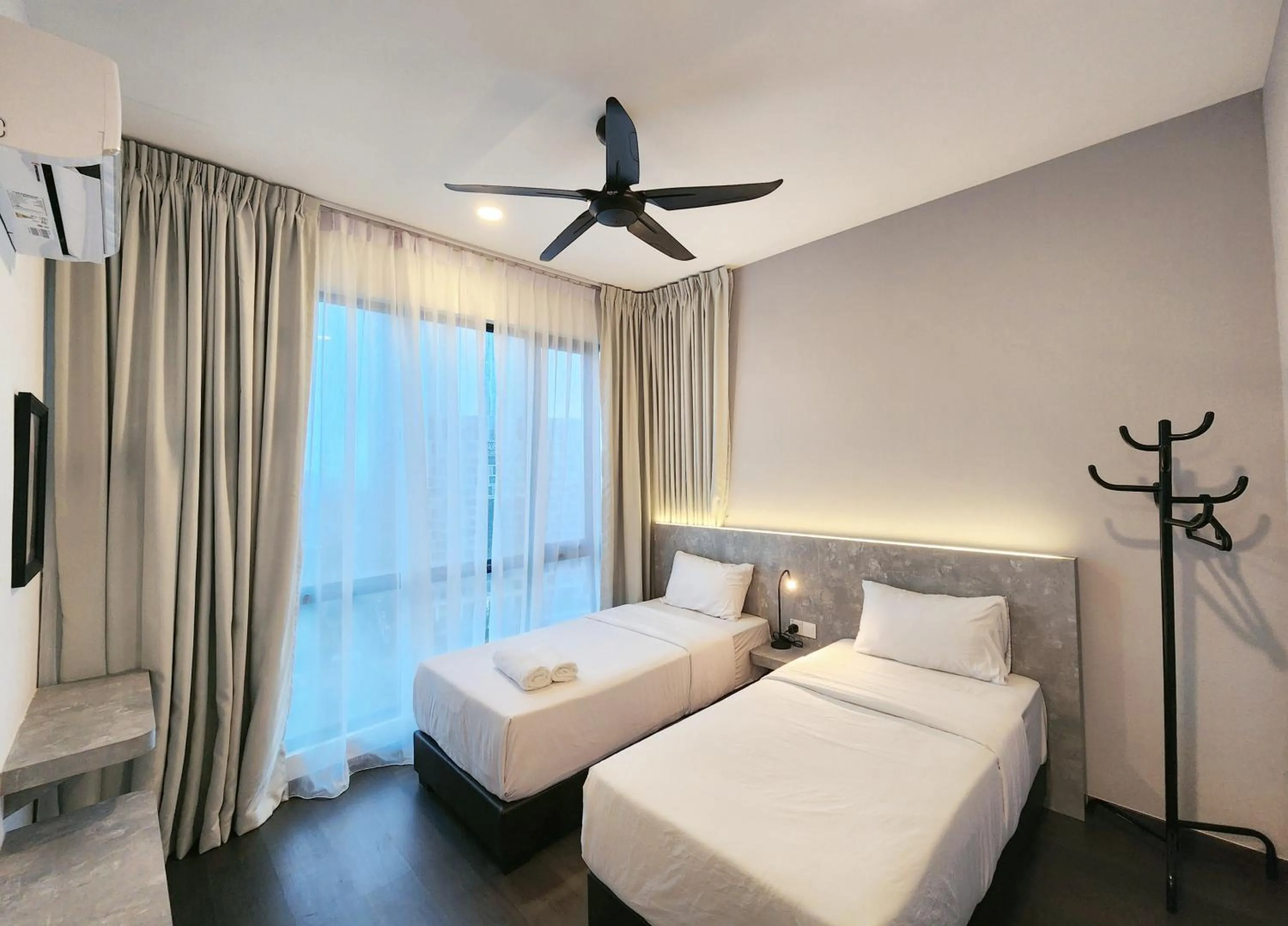 Bed in SKS Pavillion Suites