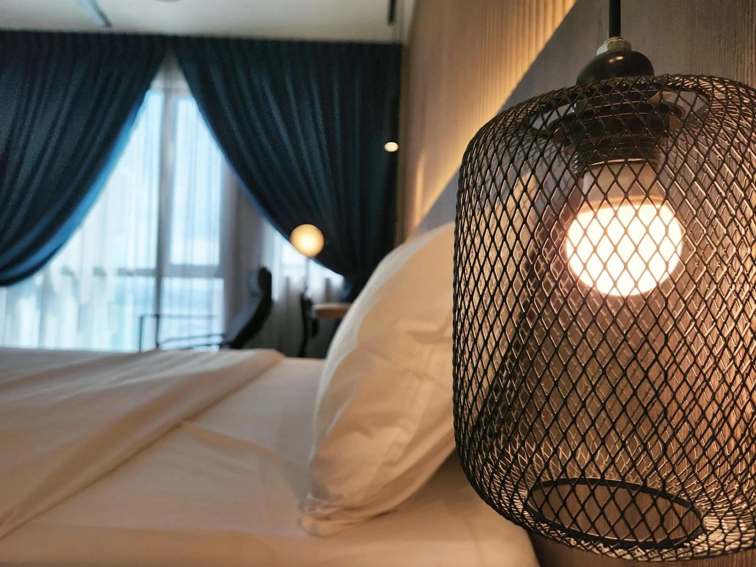 Bed in SKS Pavillion Suites