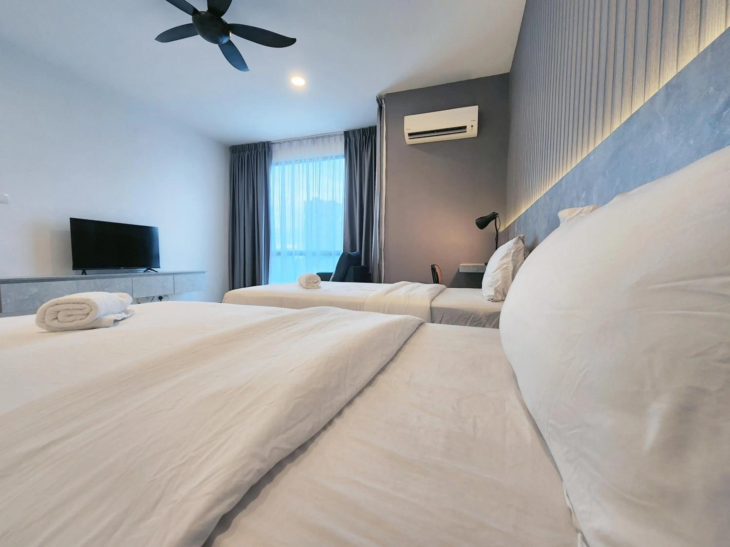 Bed in SKS Pavillion Suites