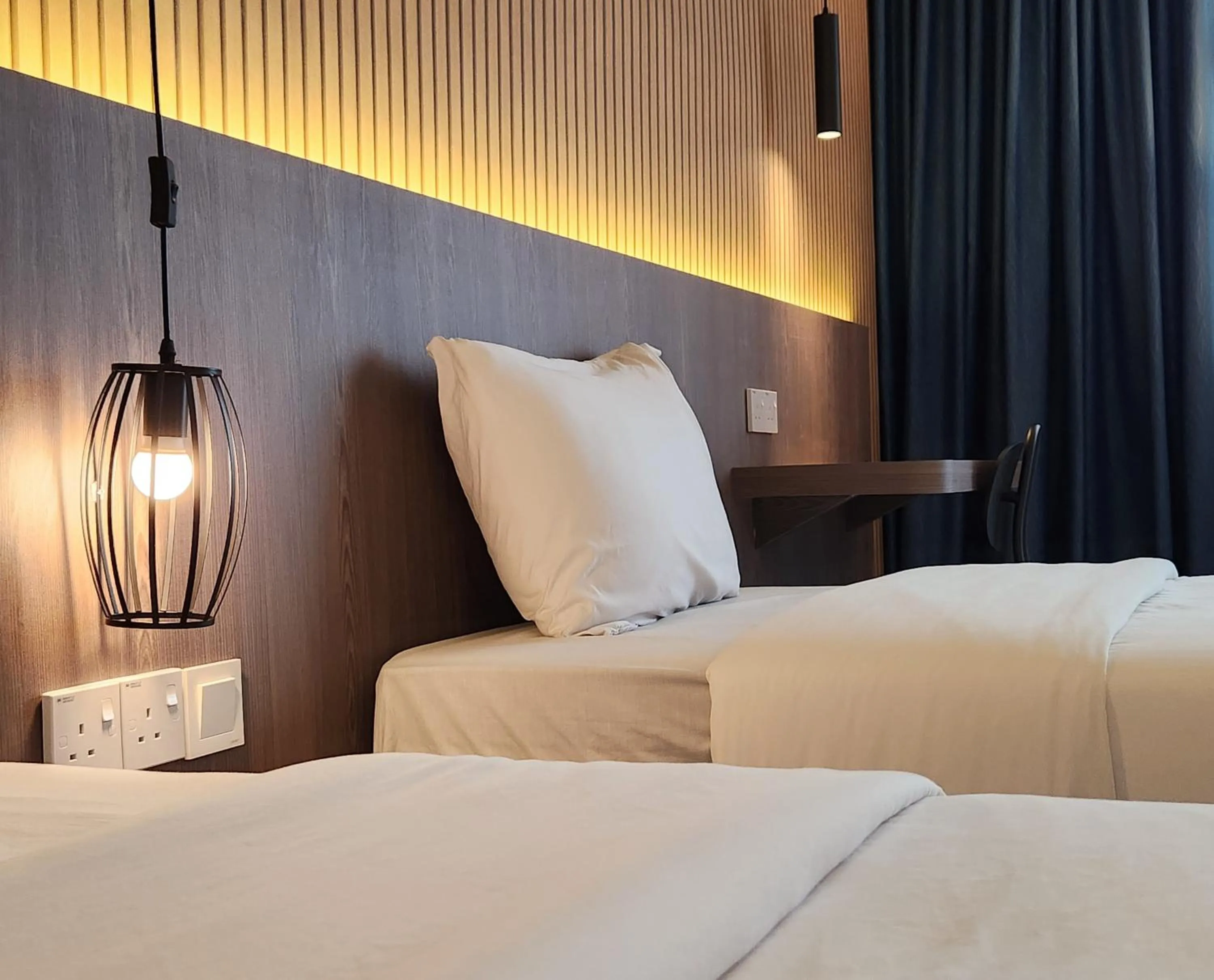 Bed in SKS Pavillion Suites