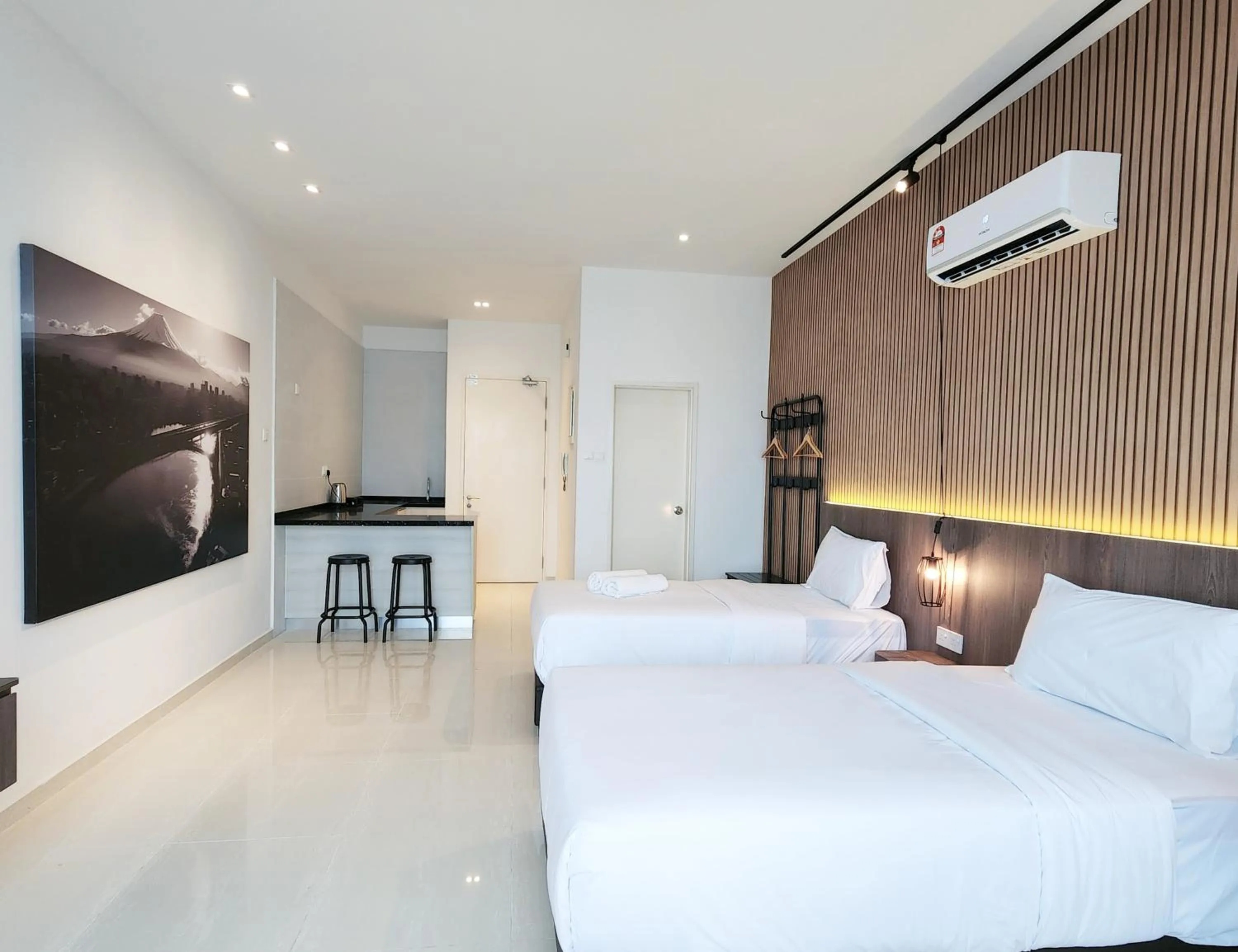 Bed in SKS Pavillion Suites