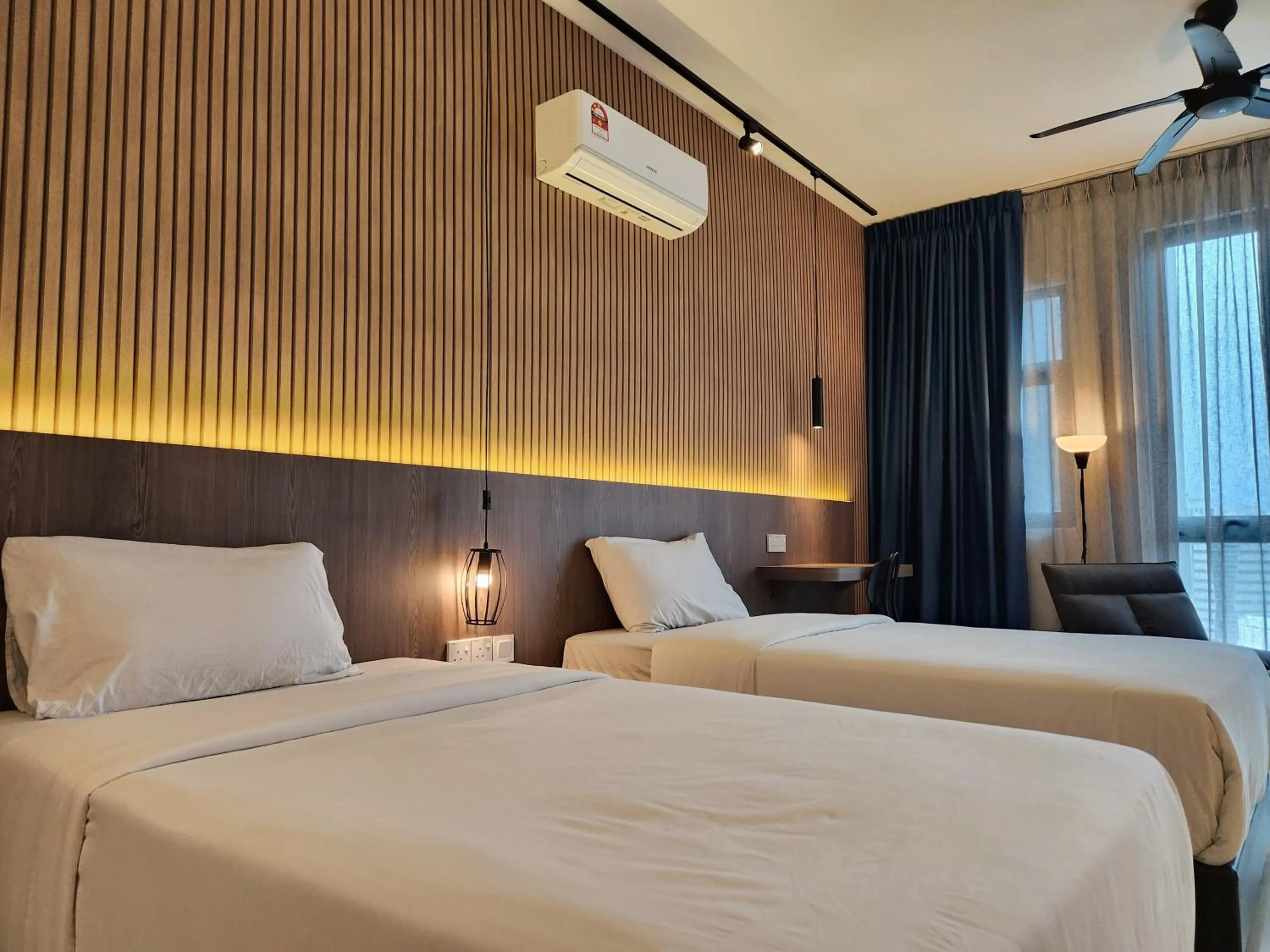 Bed in SKS Pavillion Suites