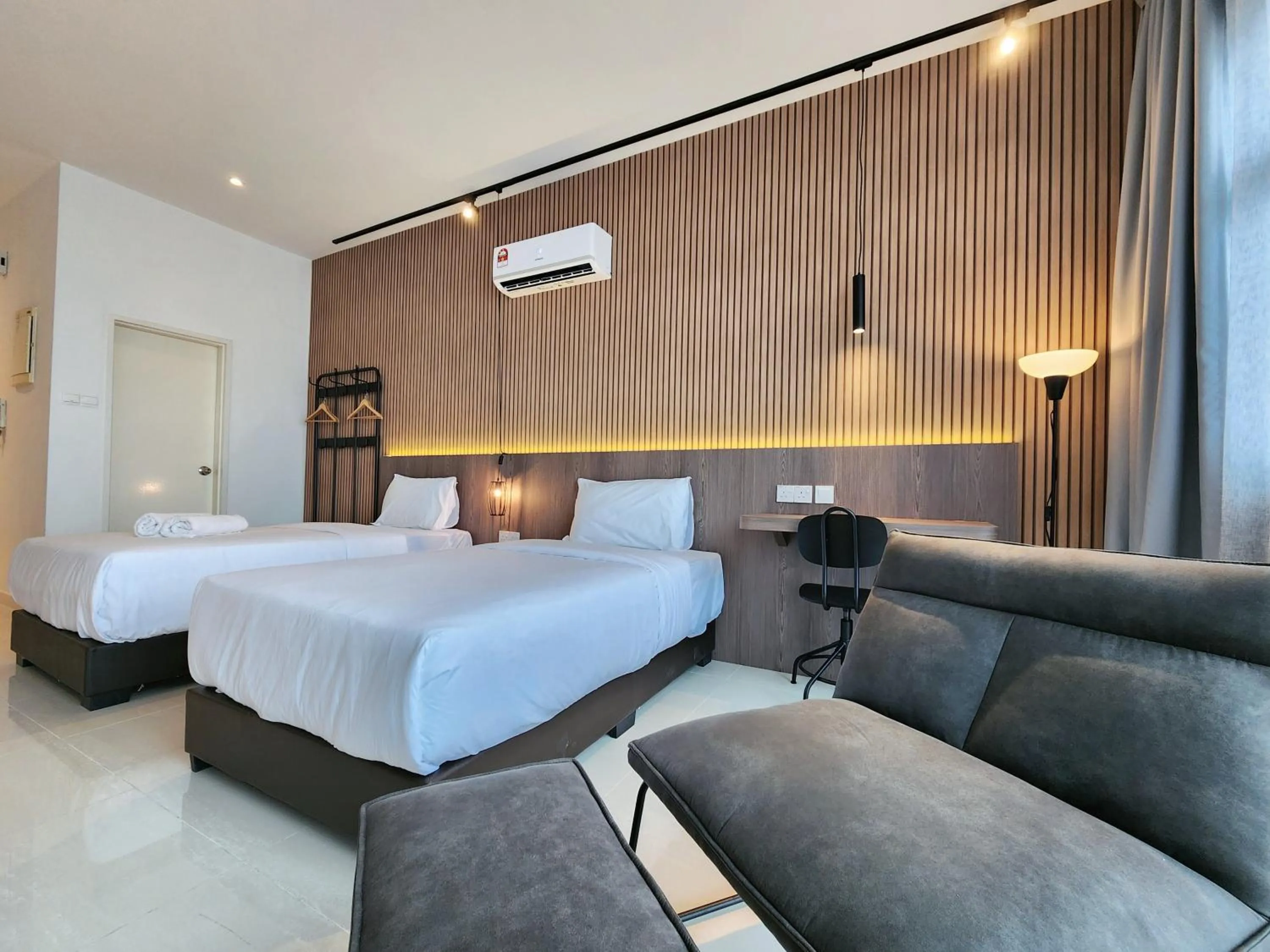 Bed in SKS Pavillion Suites