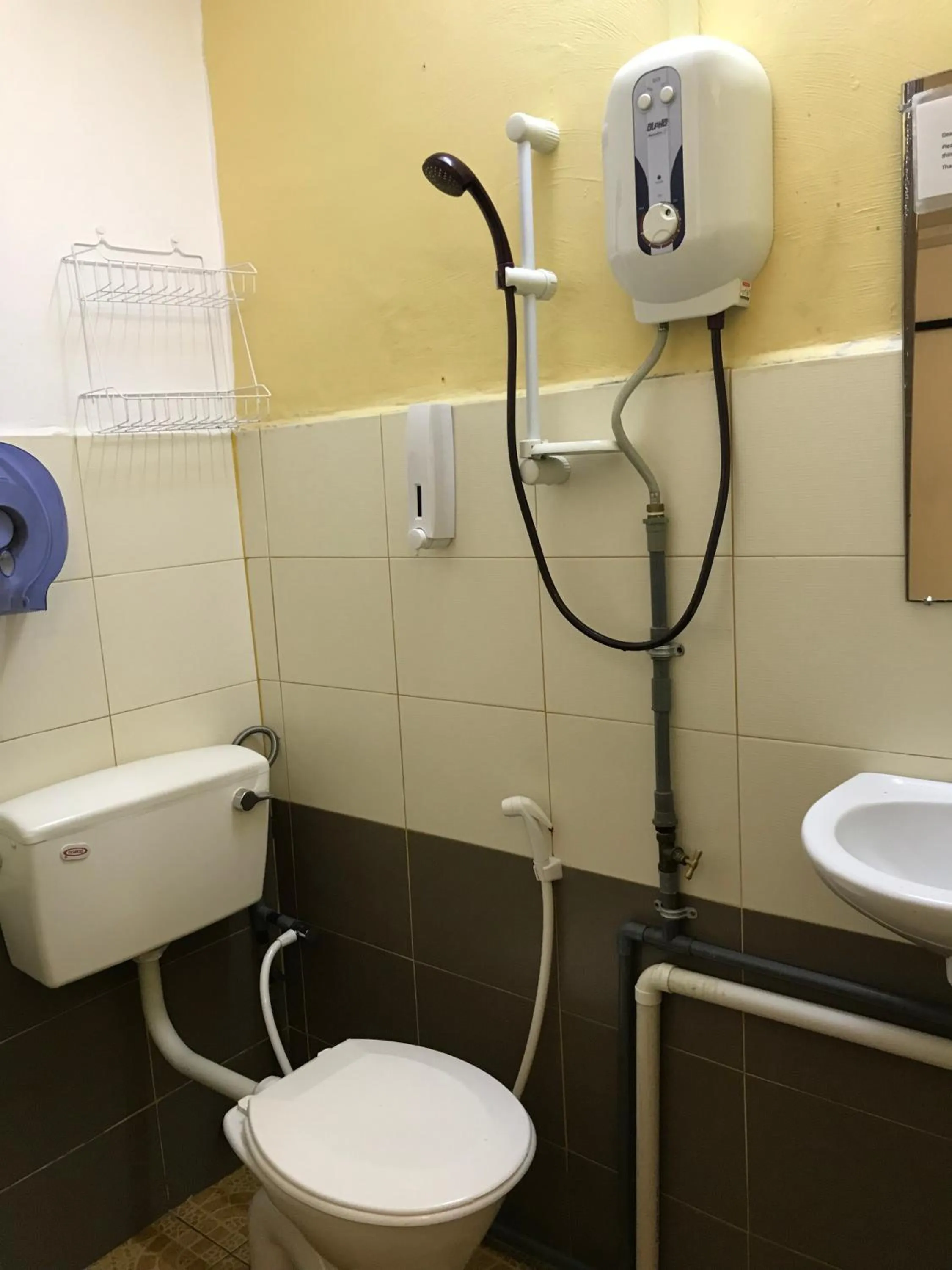 Toilet in Rasa Motel