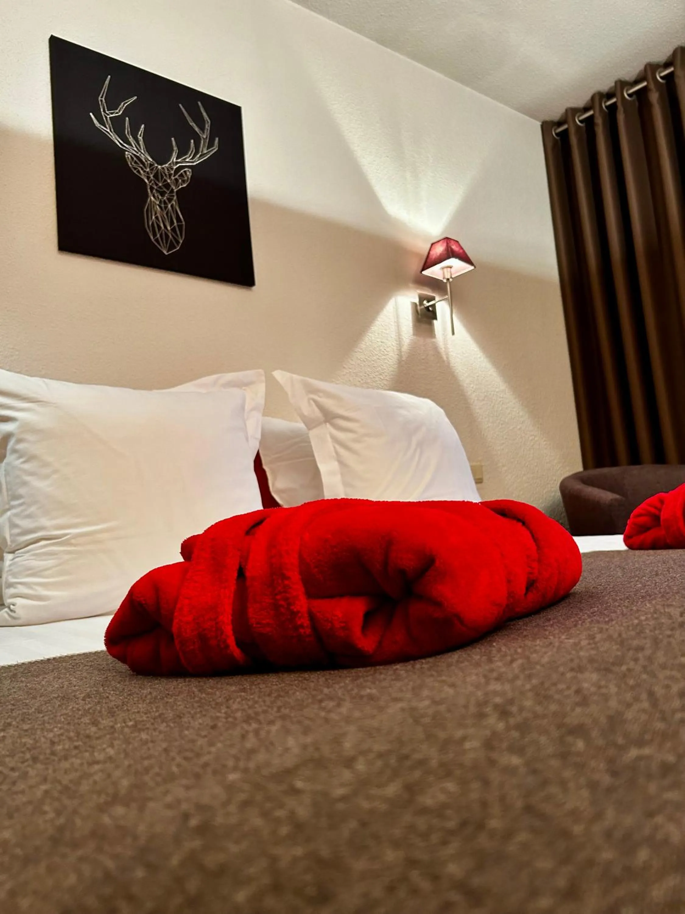 Bed in Hotel Bel'alpe