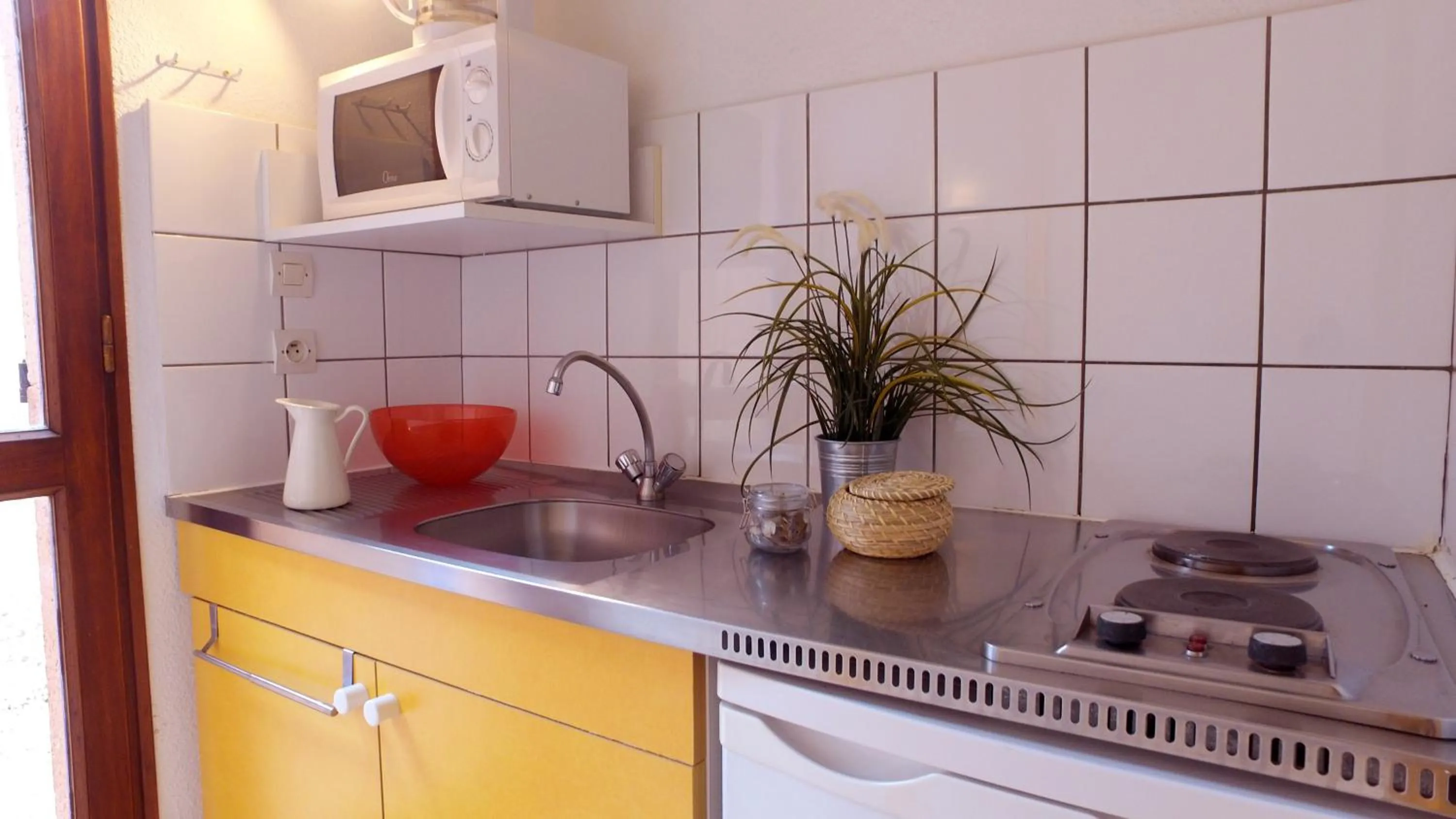 Kitchen or kitchenette in VVF Le Pays Cathare Carcassonne