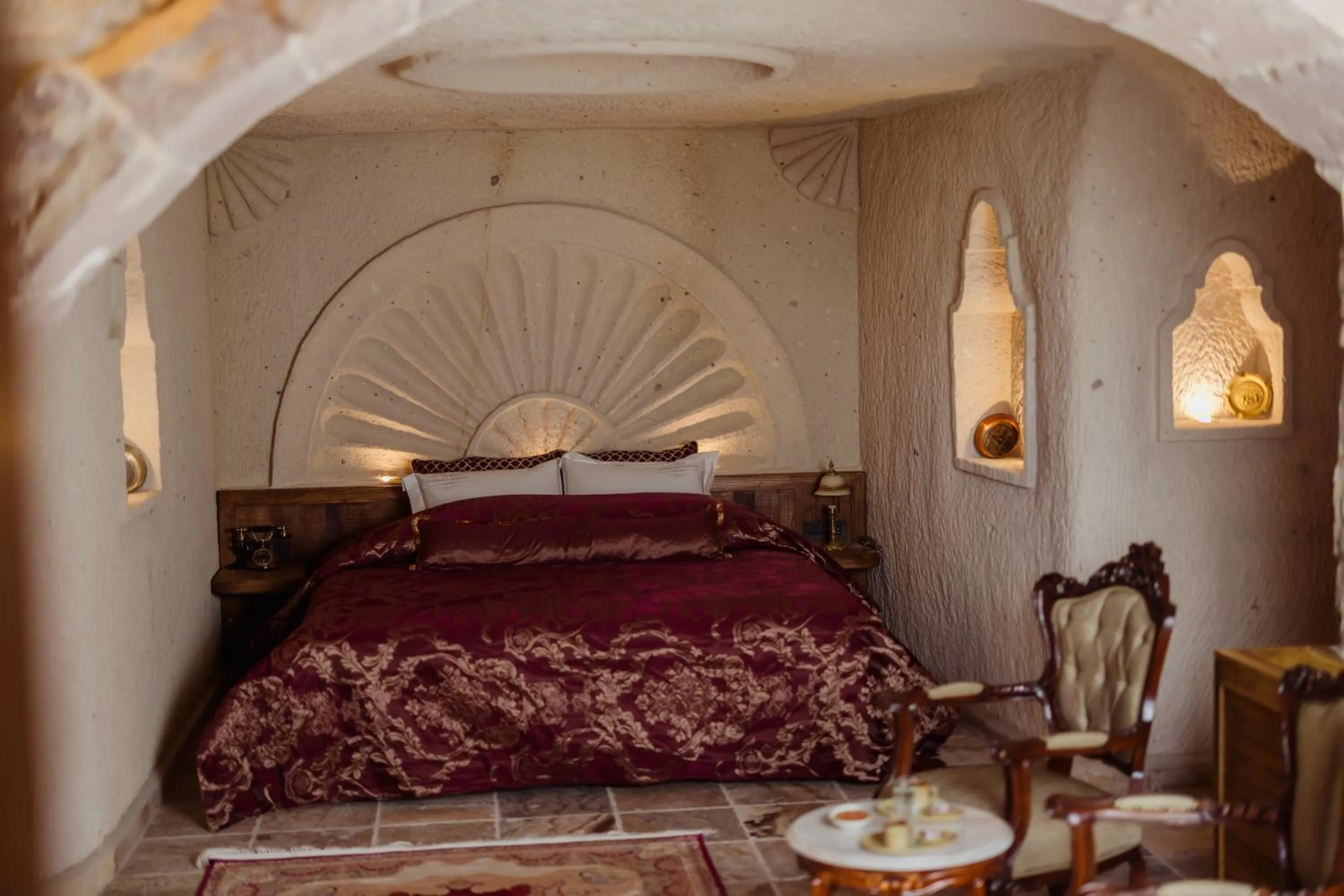 Bed in The Kingdom Of Cappadocia Luxury Cave Hotel