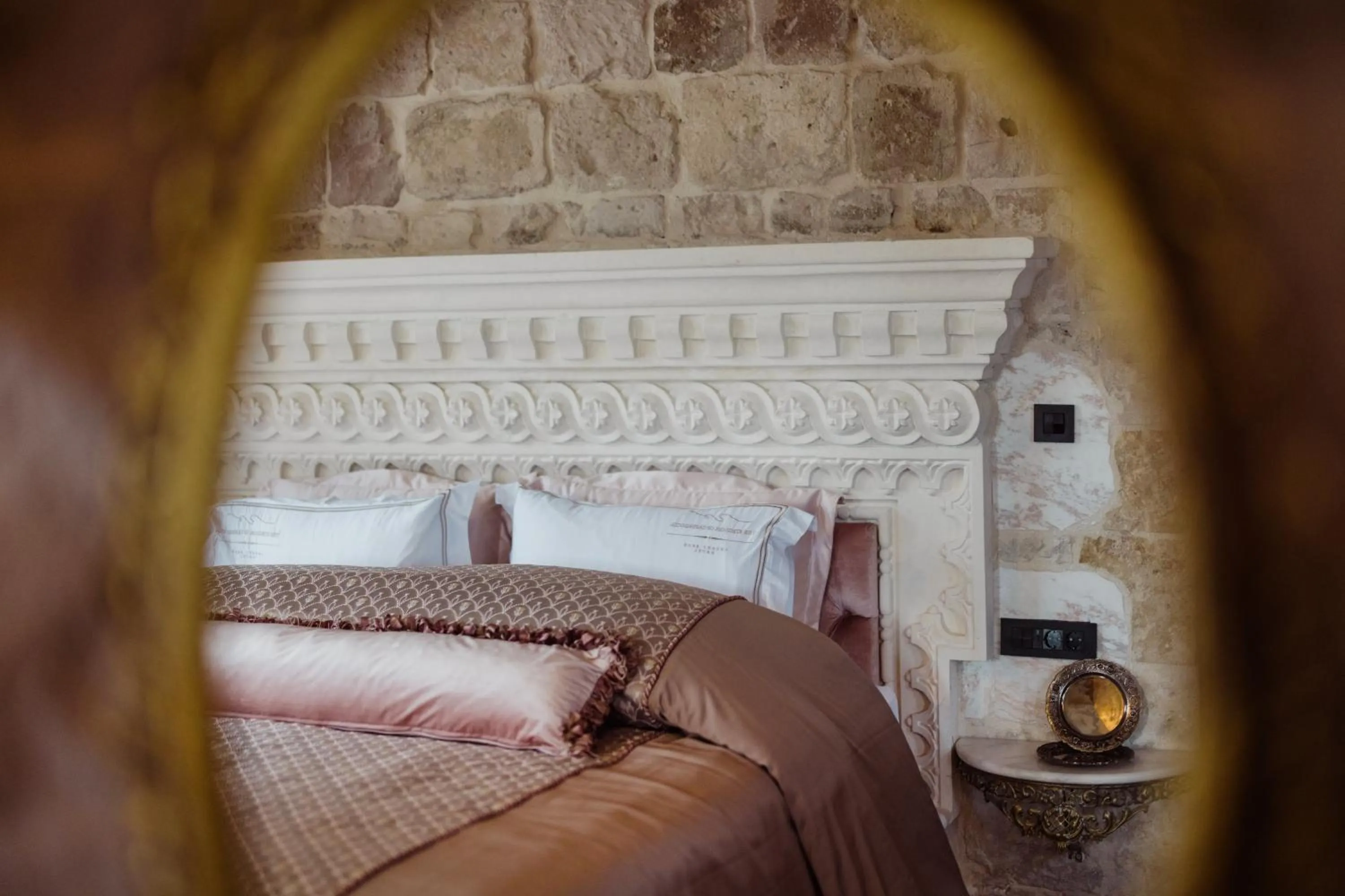 Bed in The Kingdom Of Cappadocia Luxury Cave Hotel