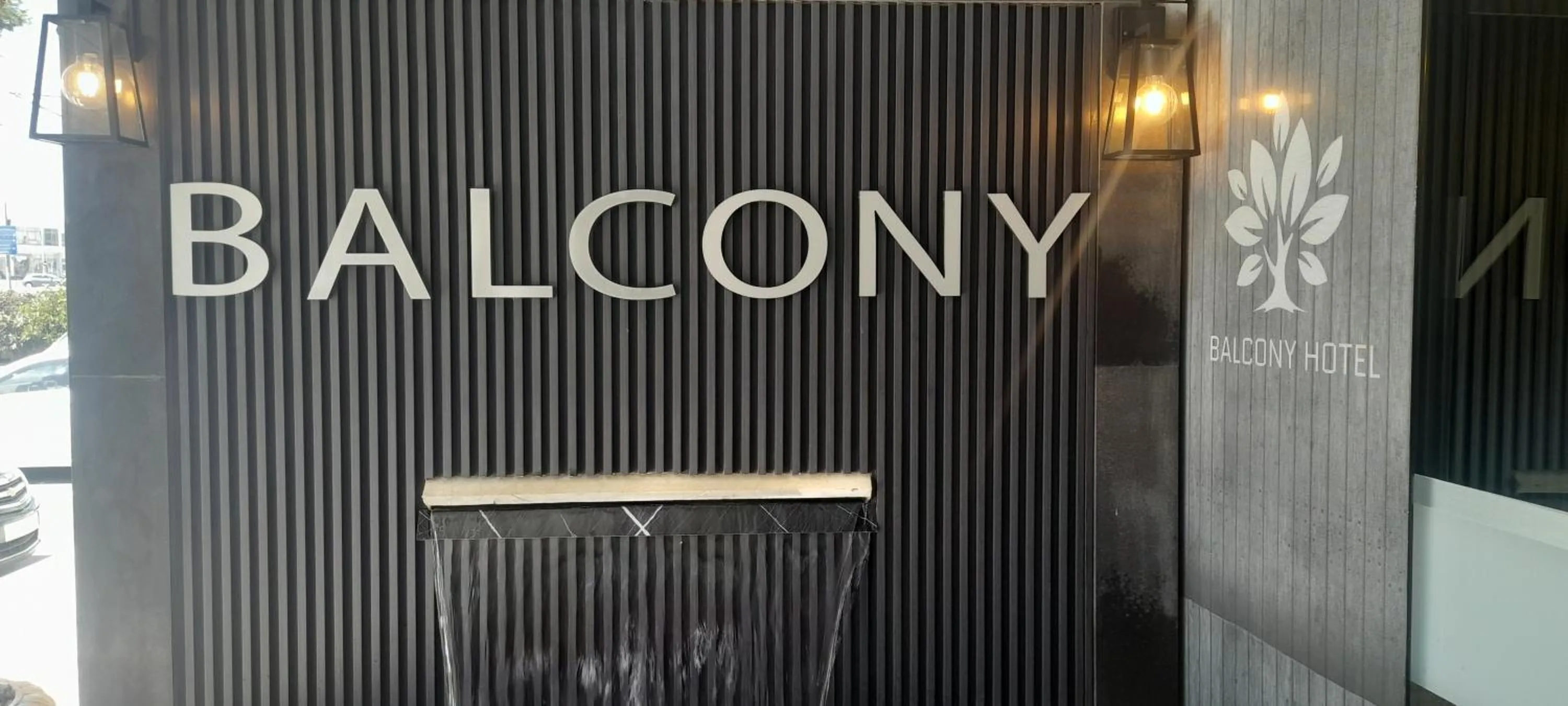 Property logo or sign in Balcony Hotel