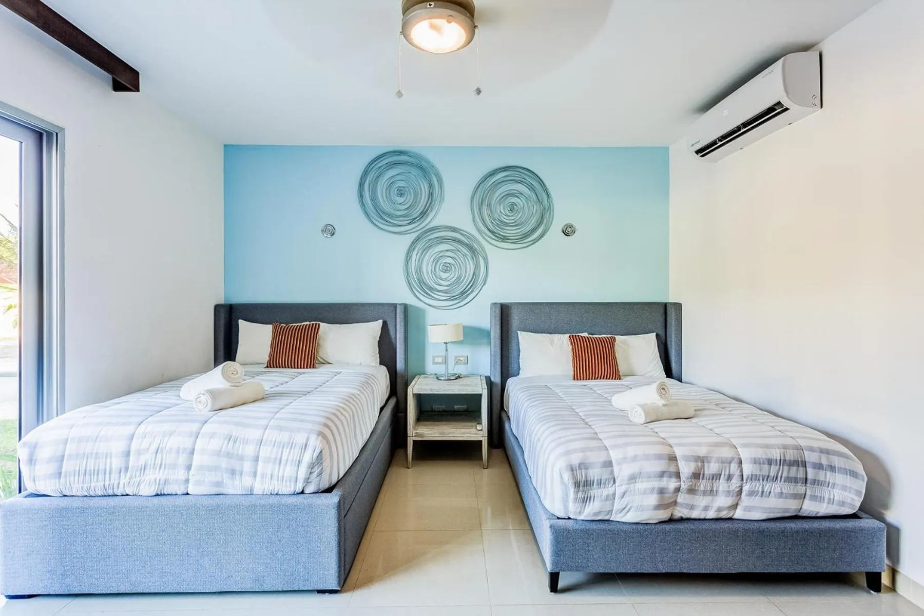 Bed in Luxury Condos at Mareazul Beachfront Complex with Resort-Style Amenities
