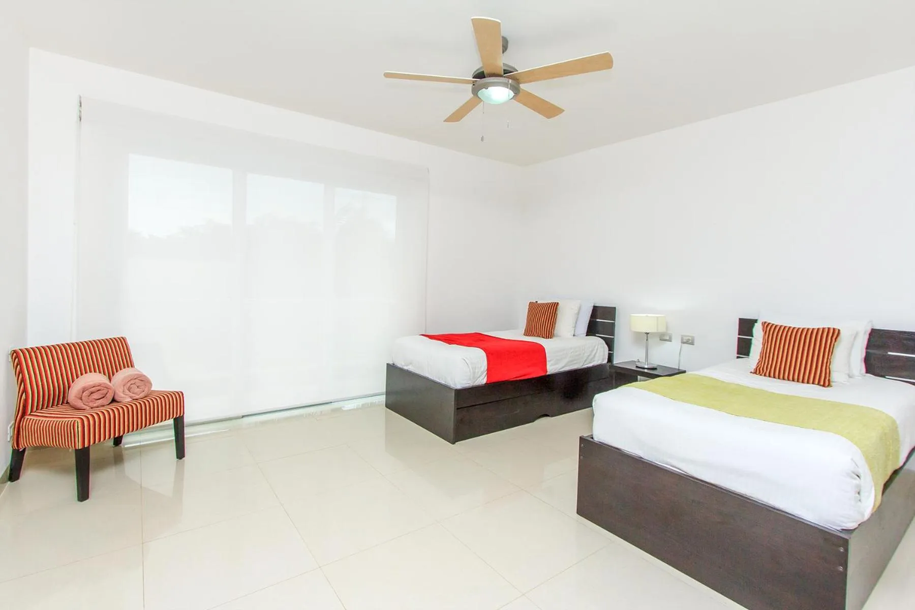 Bed in Luxury Condos at Mareazul Beachfront Complex with Resort-Style Amenities